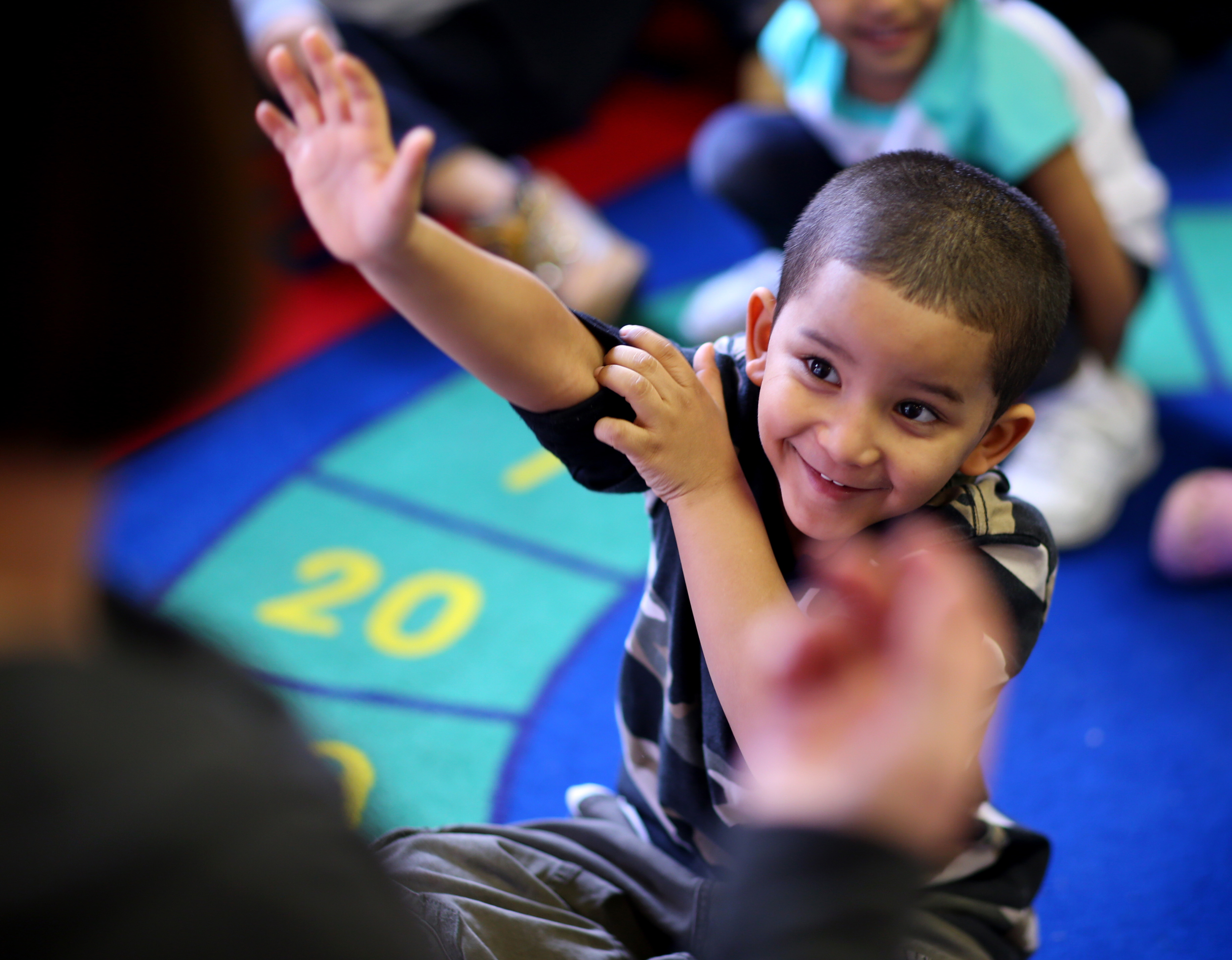Arix Santana attends a Lowell center where teacher pay is lower.