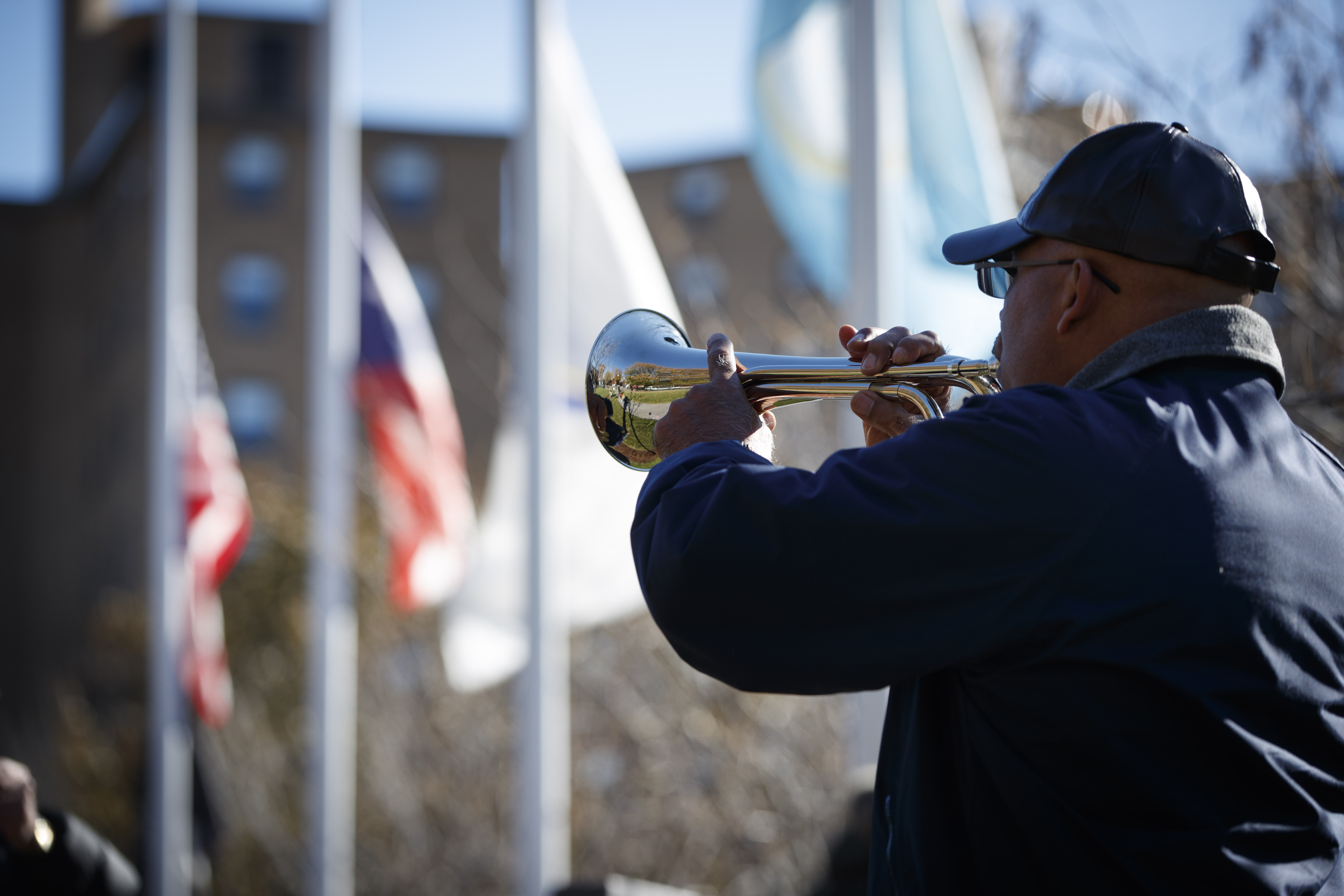 Guillermo Candalario played “Taps” during the ceremony on Saturday.