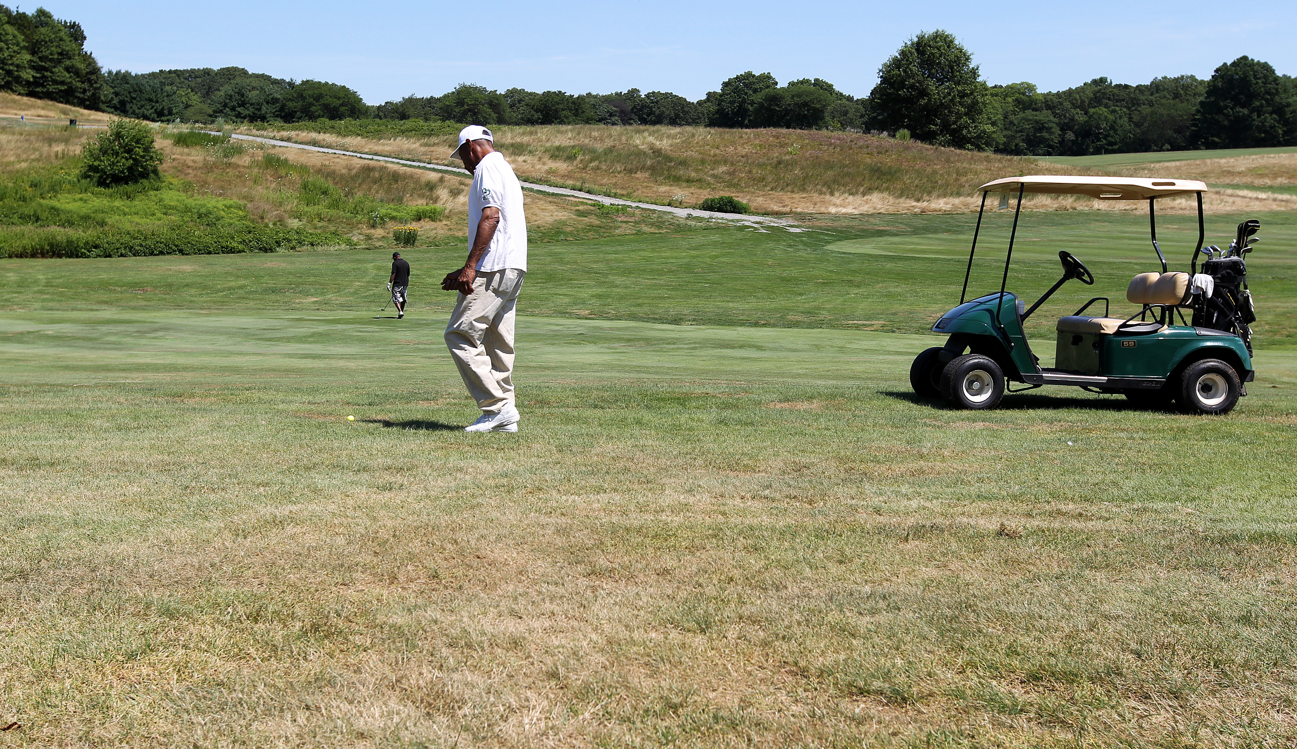 Men played on the 11th fairway in July 2010.