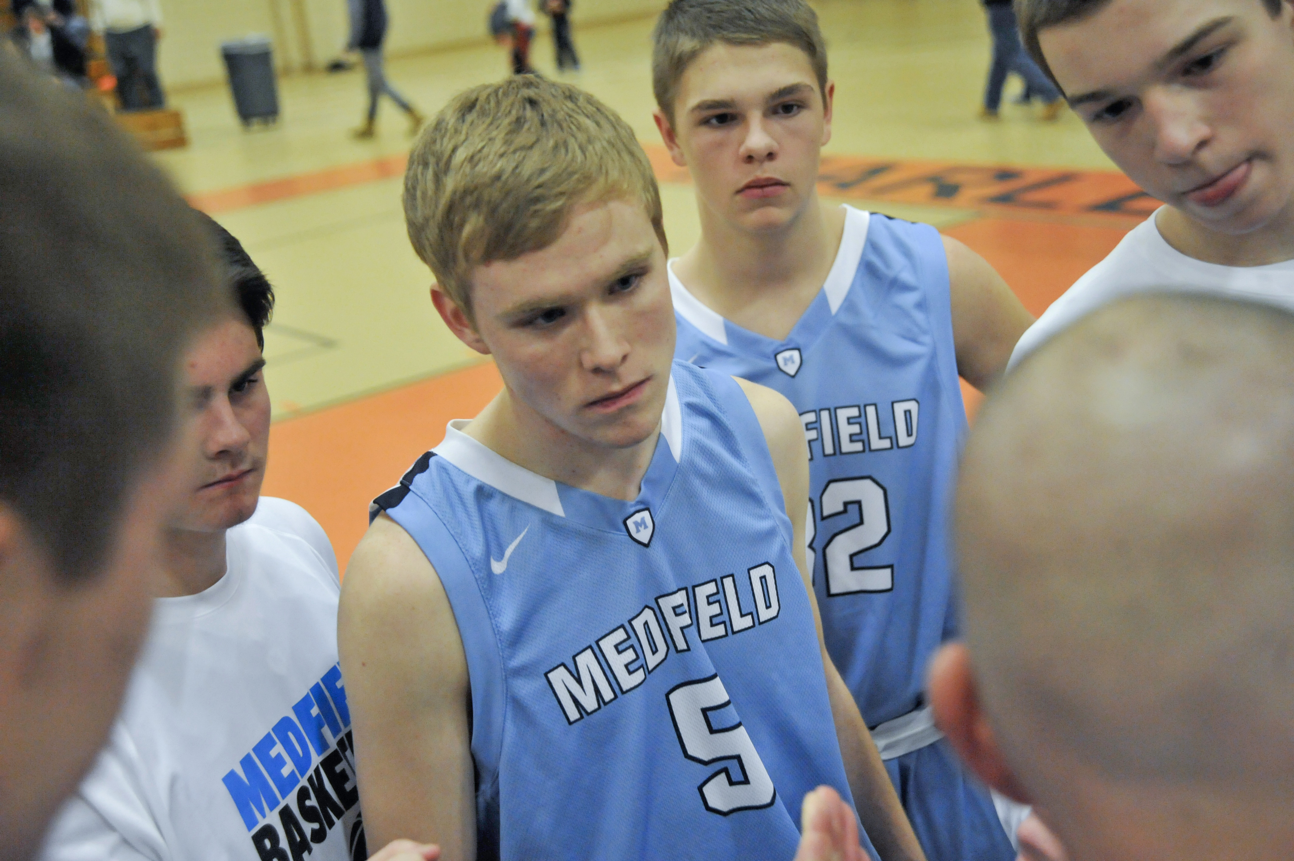 Jack Cadigan listened to coaches as Medfield took on Marlborough in February.