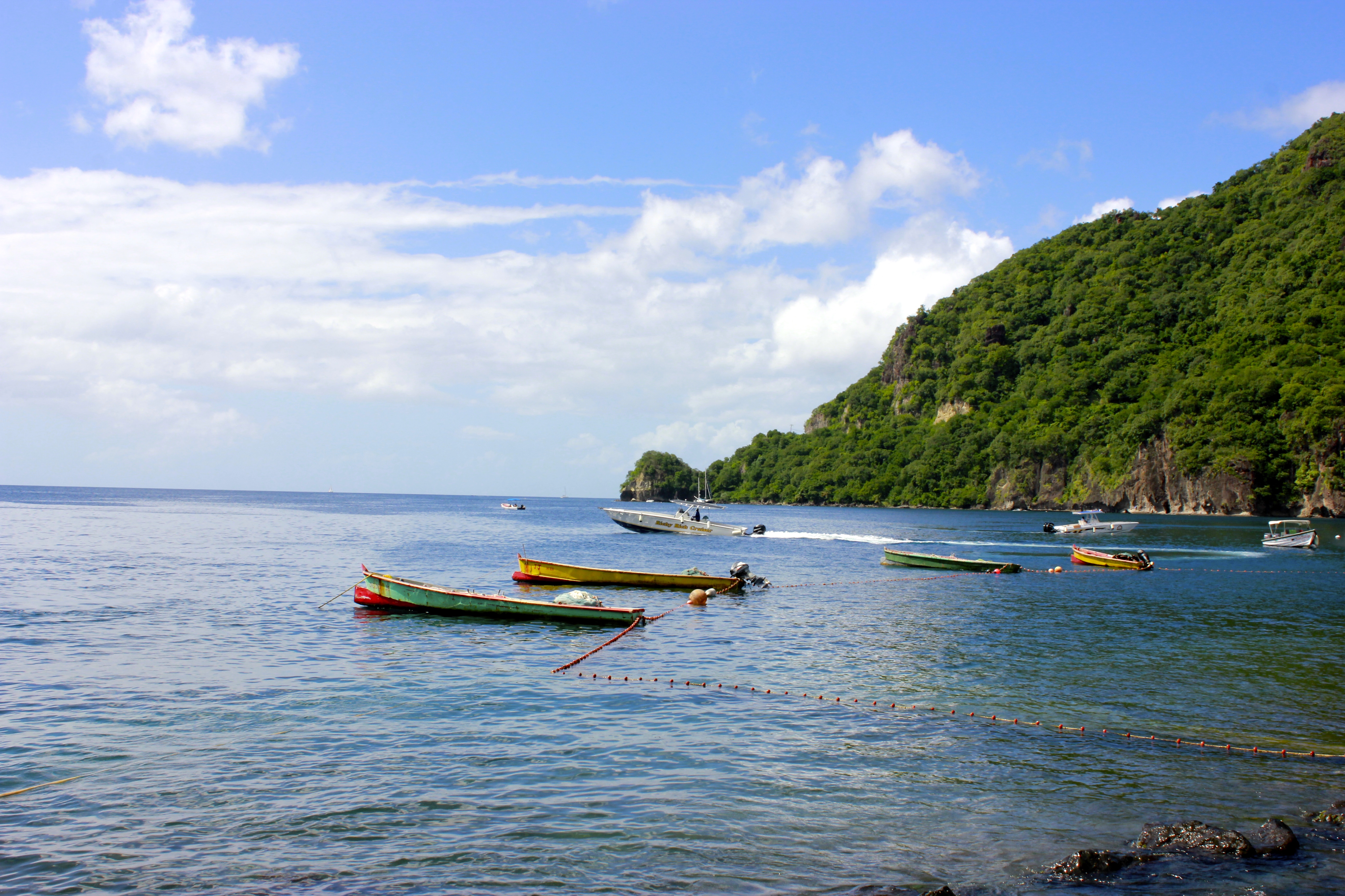 Boats bob in the water off Soufrière, St. Lucia.