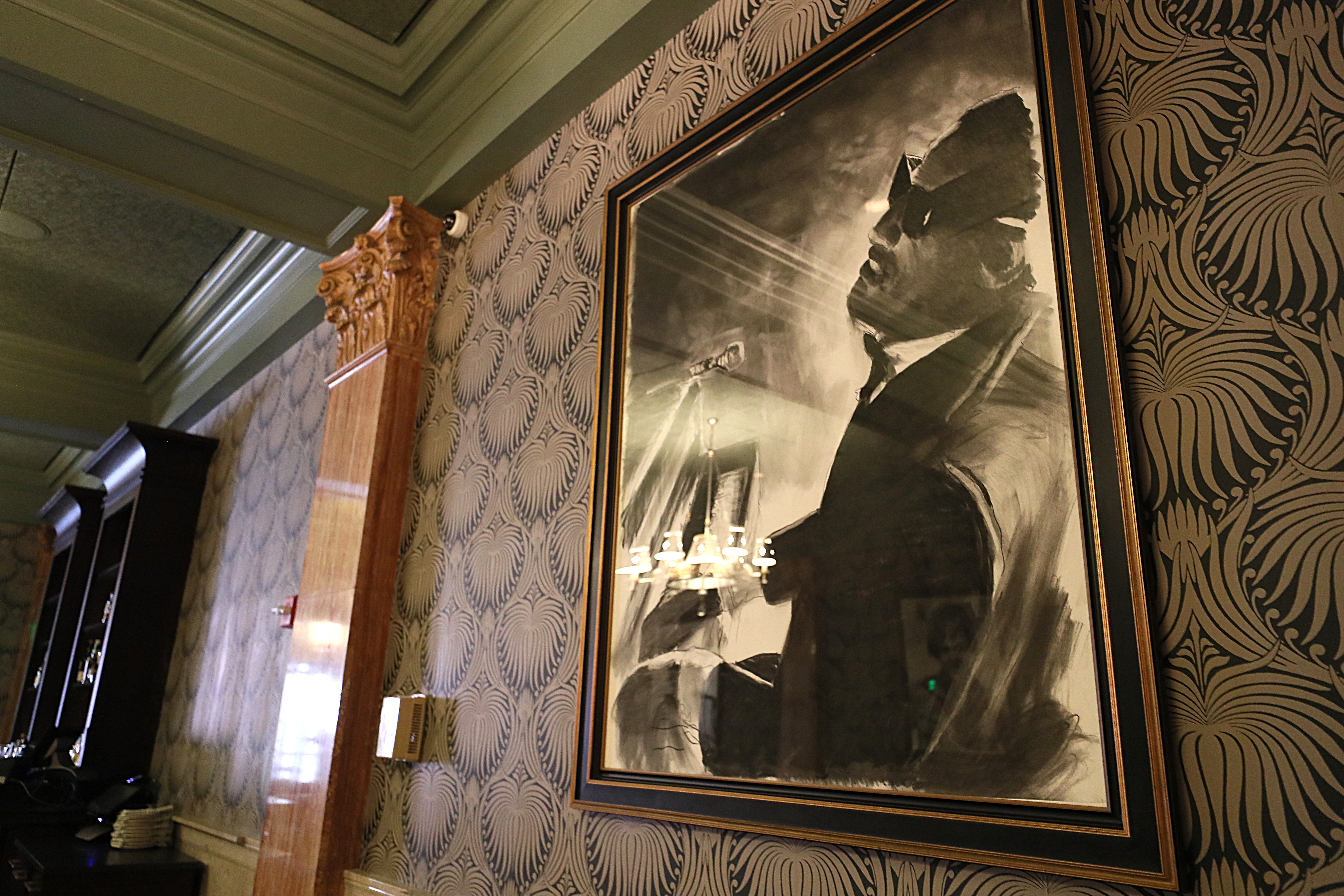 A charcoal rendering of Ray Charles at Explorateur.
