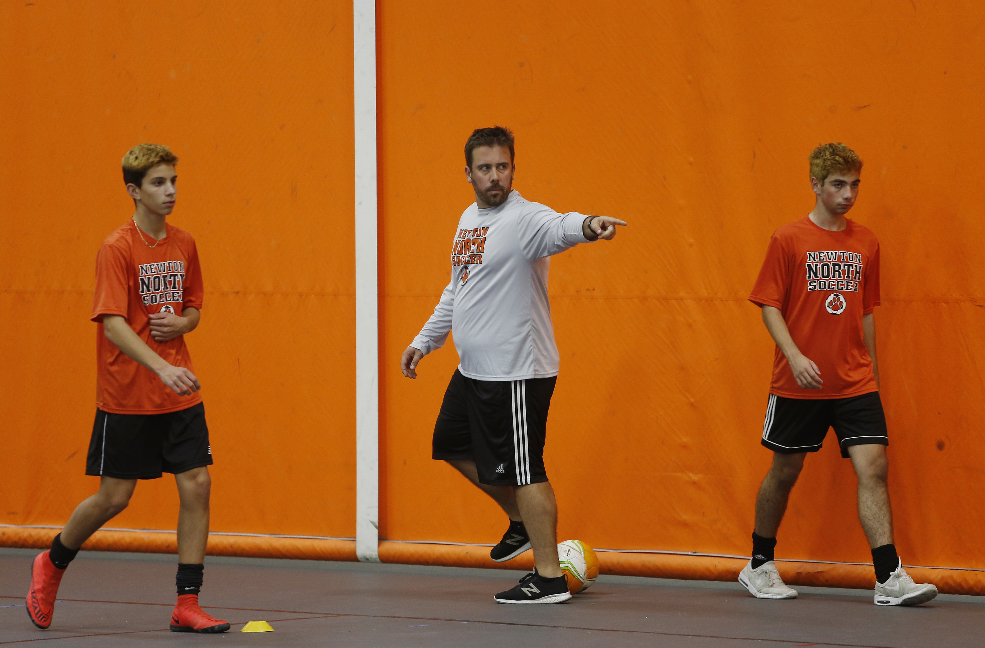 Newton North boys’ soccer coach Roy Dow (center) has his team pointed in the right direction headed into the Division 1 North tournament.