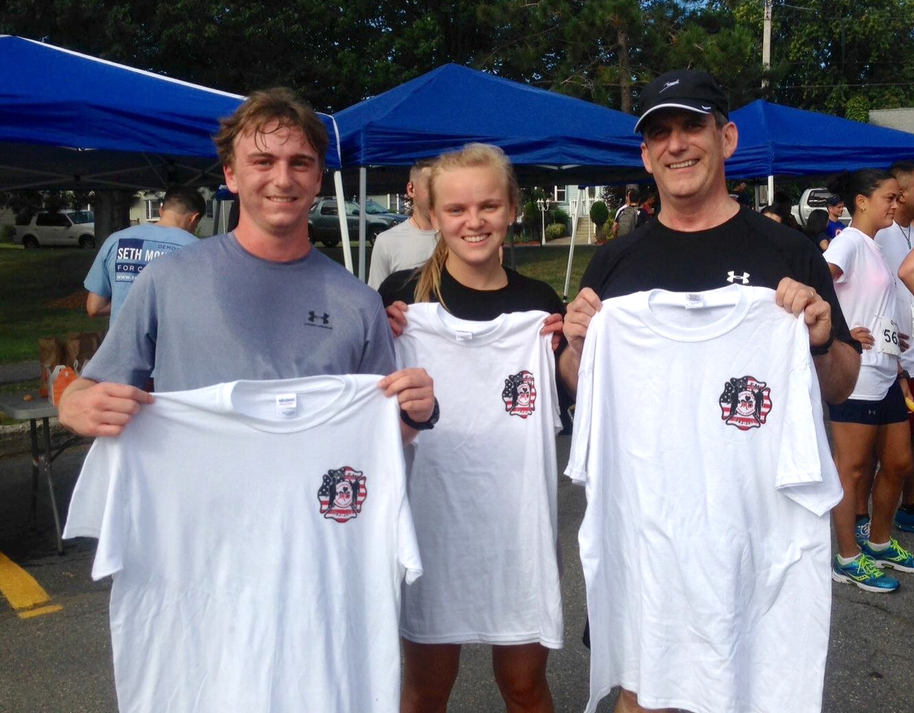 From left to right: Andrew, Anna, and Joseph Trustey after a charity road race last summer.