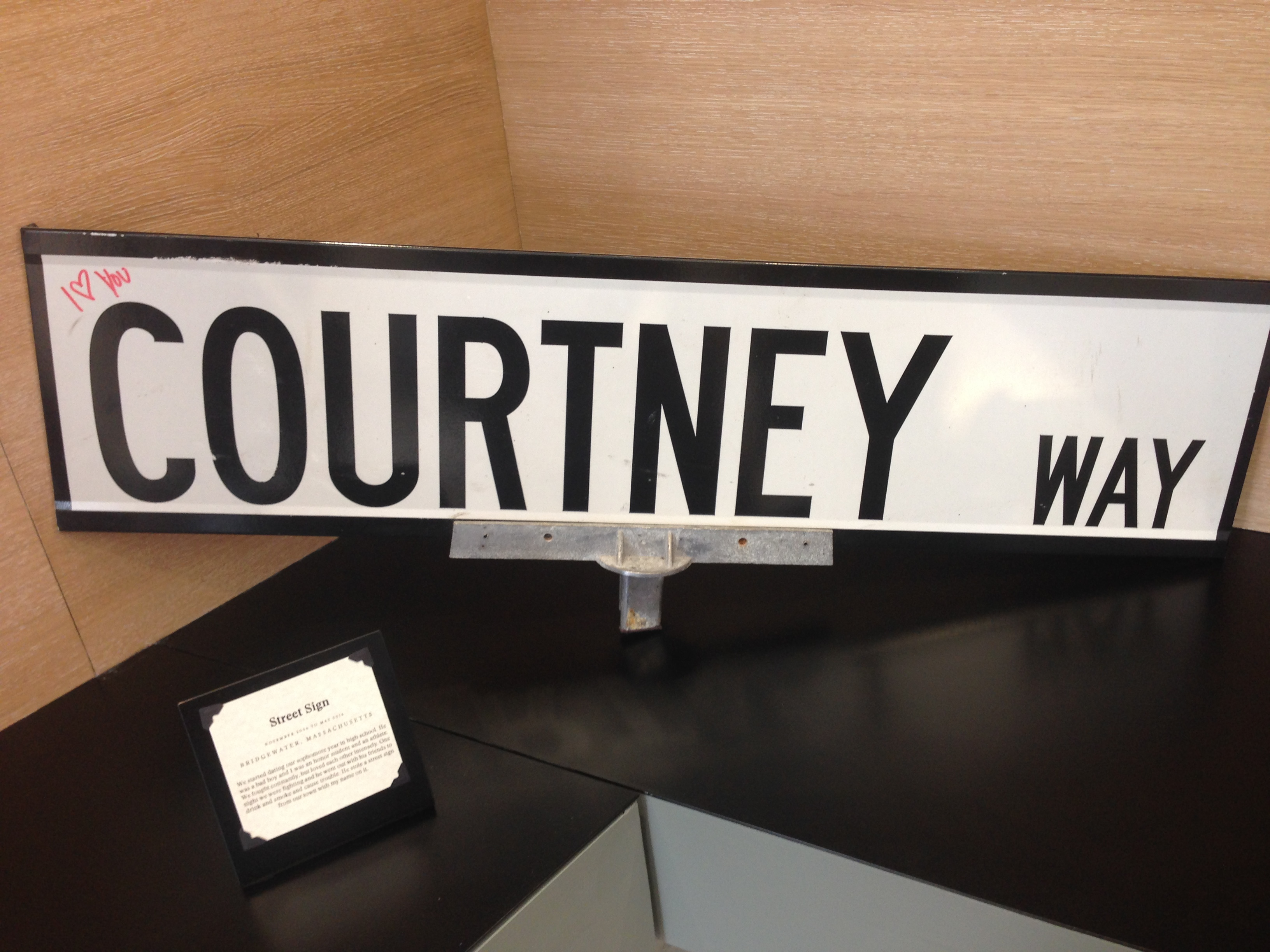 A street sign declares one’s love for Courtney.