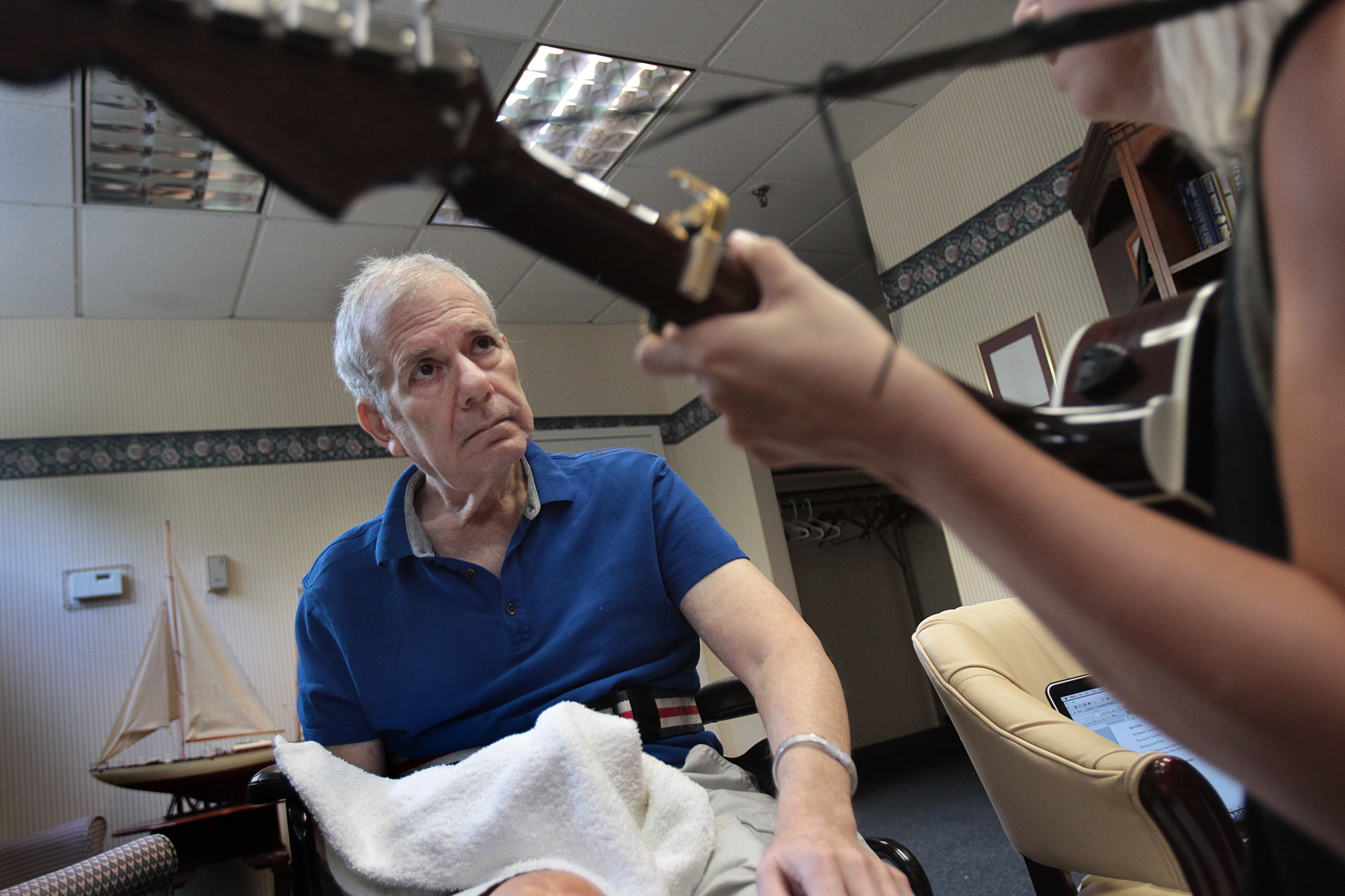 Tracey Raisis, who suffered a stroke in 2014, participates in a music therapy session with Chrissy Cetnar, a music therapist.