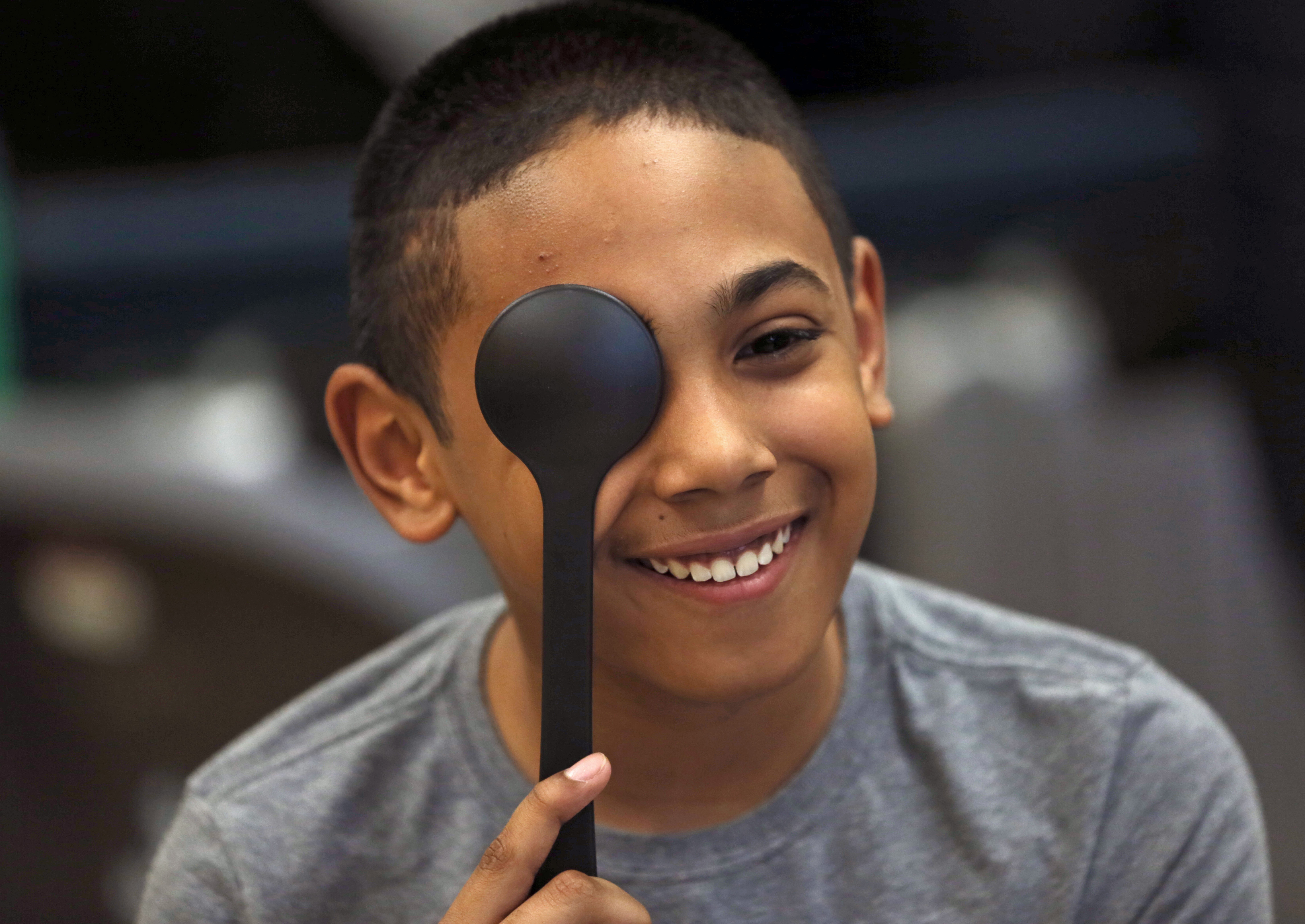 Sixth-grader Emanuel Forero got his eyes tested.