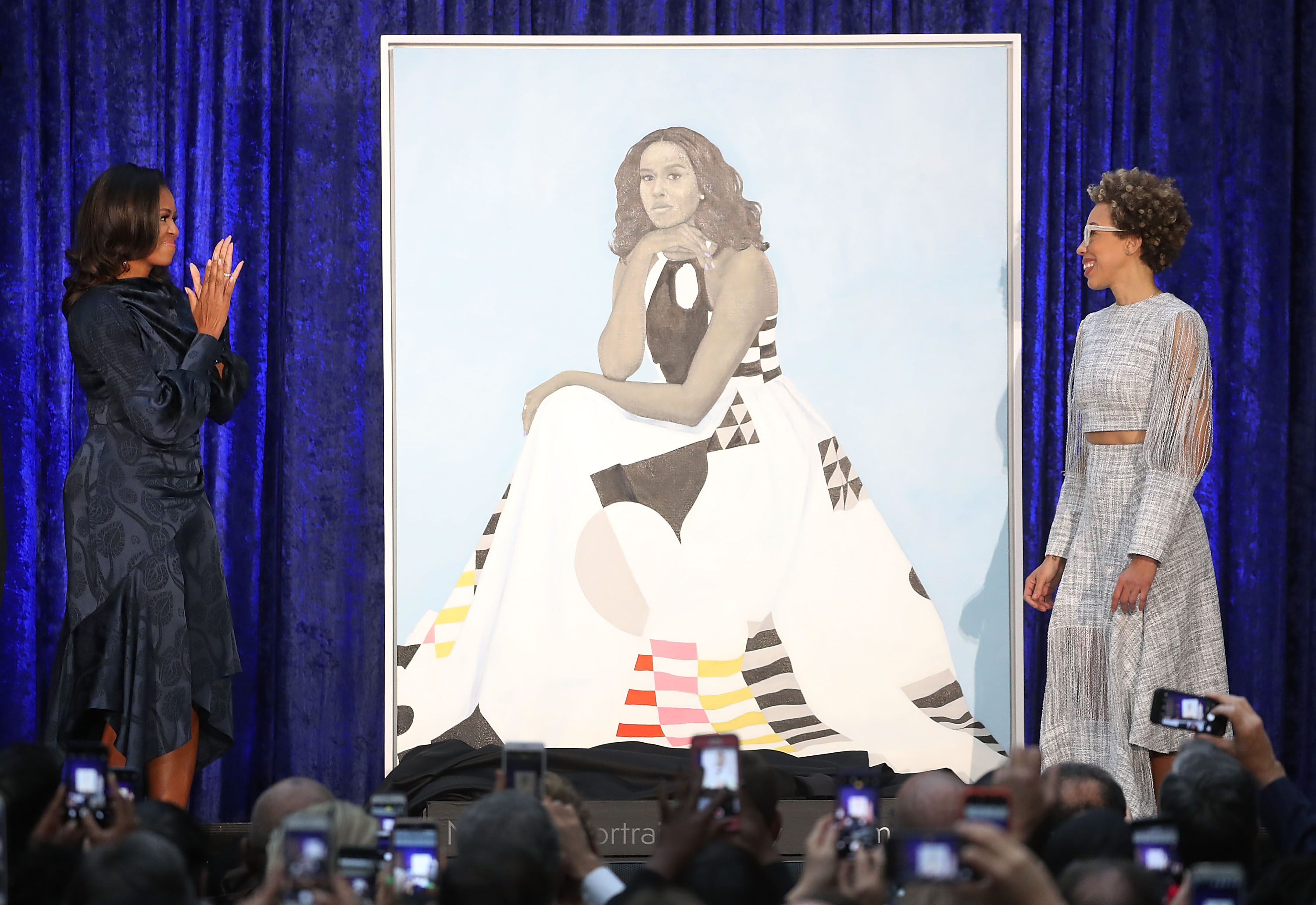 Michelle Obama (left) with artist Amy Sherald.
