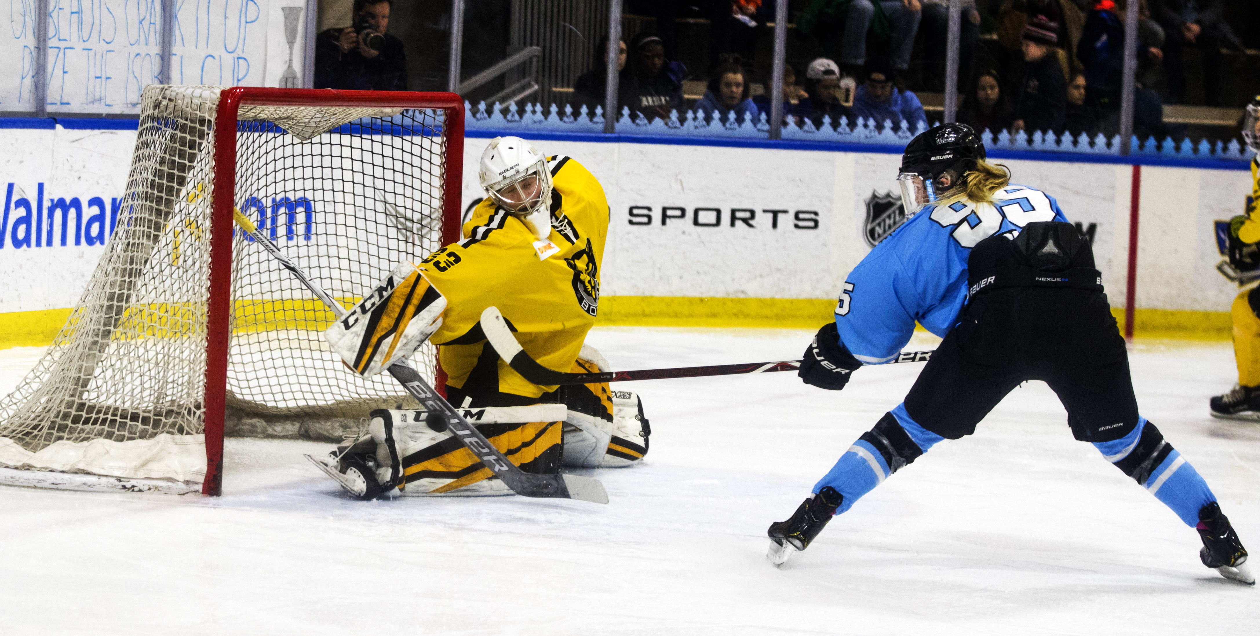 Burt makes a save for the Boston Pride against the Buffalo Beaus in an NWHL playoff game.