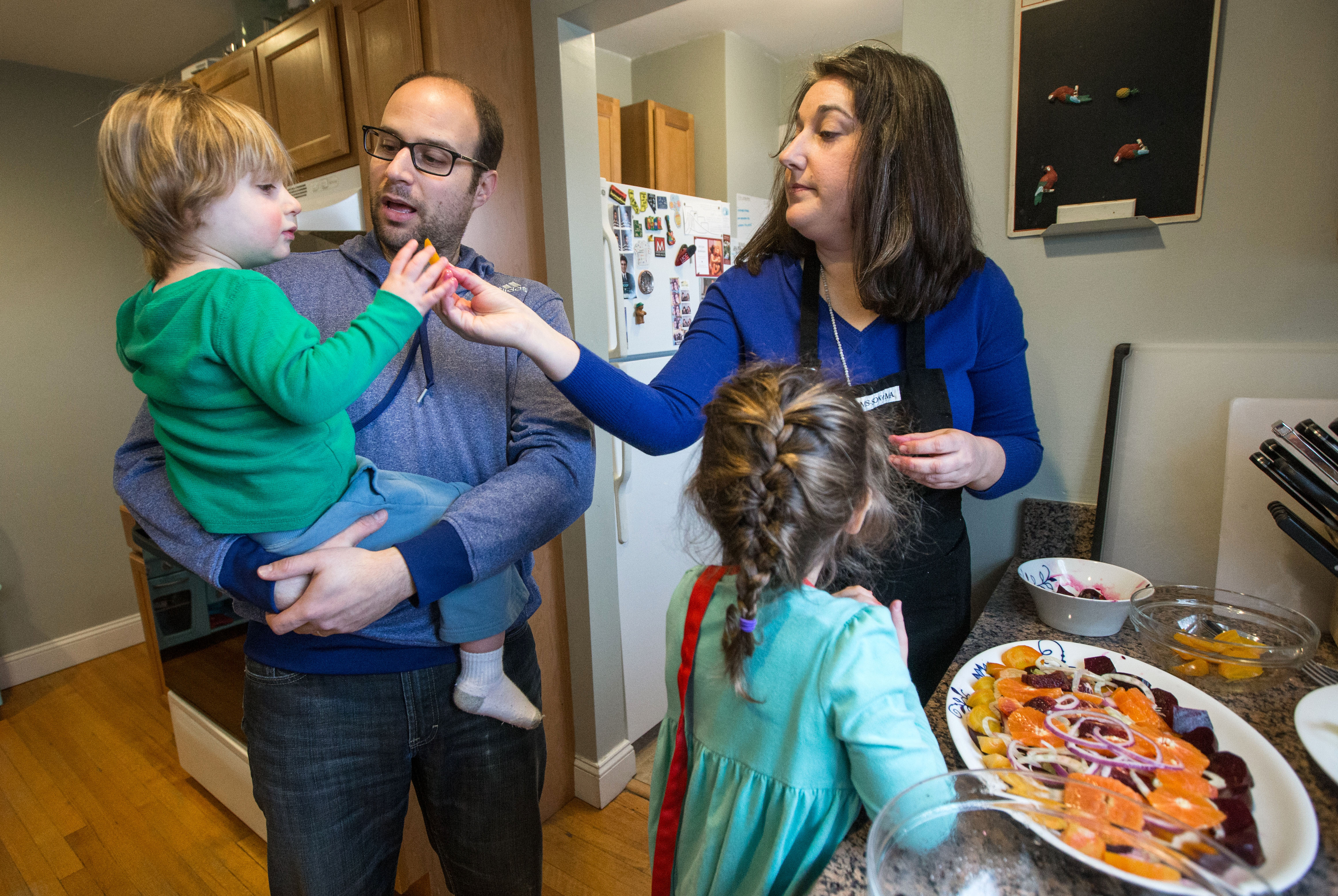 Sarah Ruderman Wilensky is hosting Passover this year for some family (including, above, husband Ryan, and kids Miles, 2, and Emmy, 4) and friends, but without her parents. “It gives us an opportunity to modernize our meal,” she says.