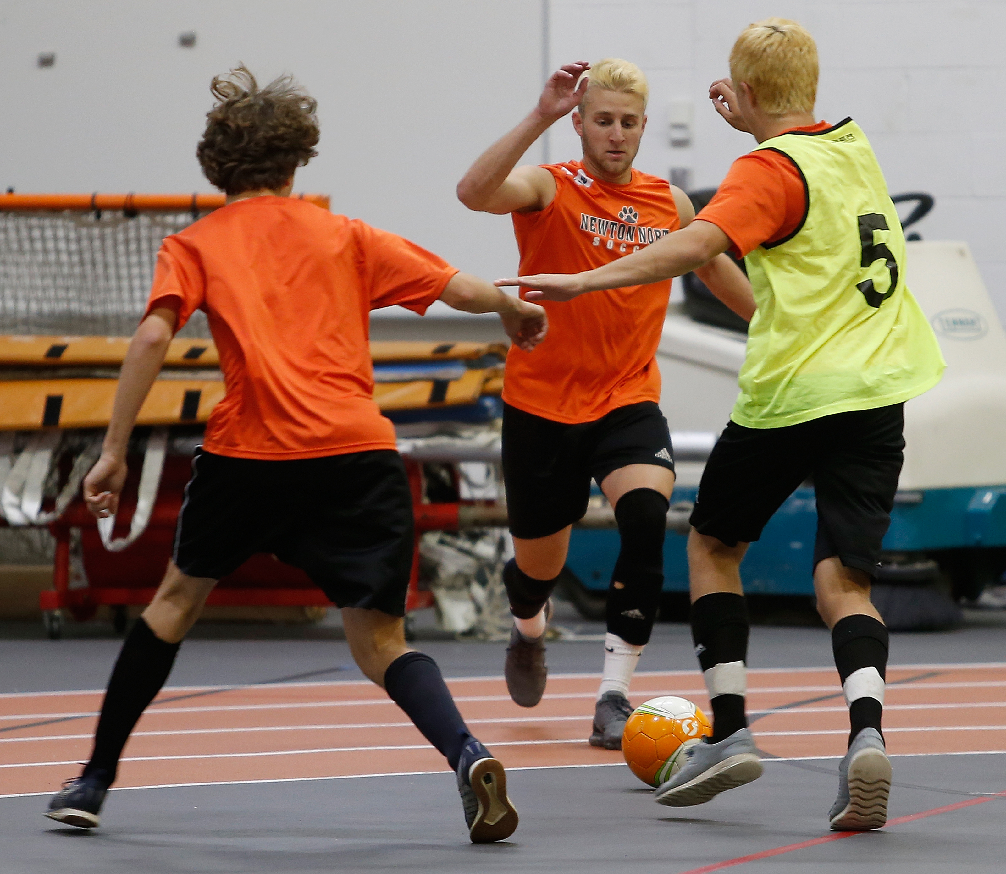 Newton North team captain Sam Meiselman (center), here competing for a ball during practice, said his teammates lived up to the their motto — ‘Play for November’ — by winning the Bay State Conference title. Next: a deep run in the D1 North tourney.