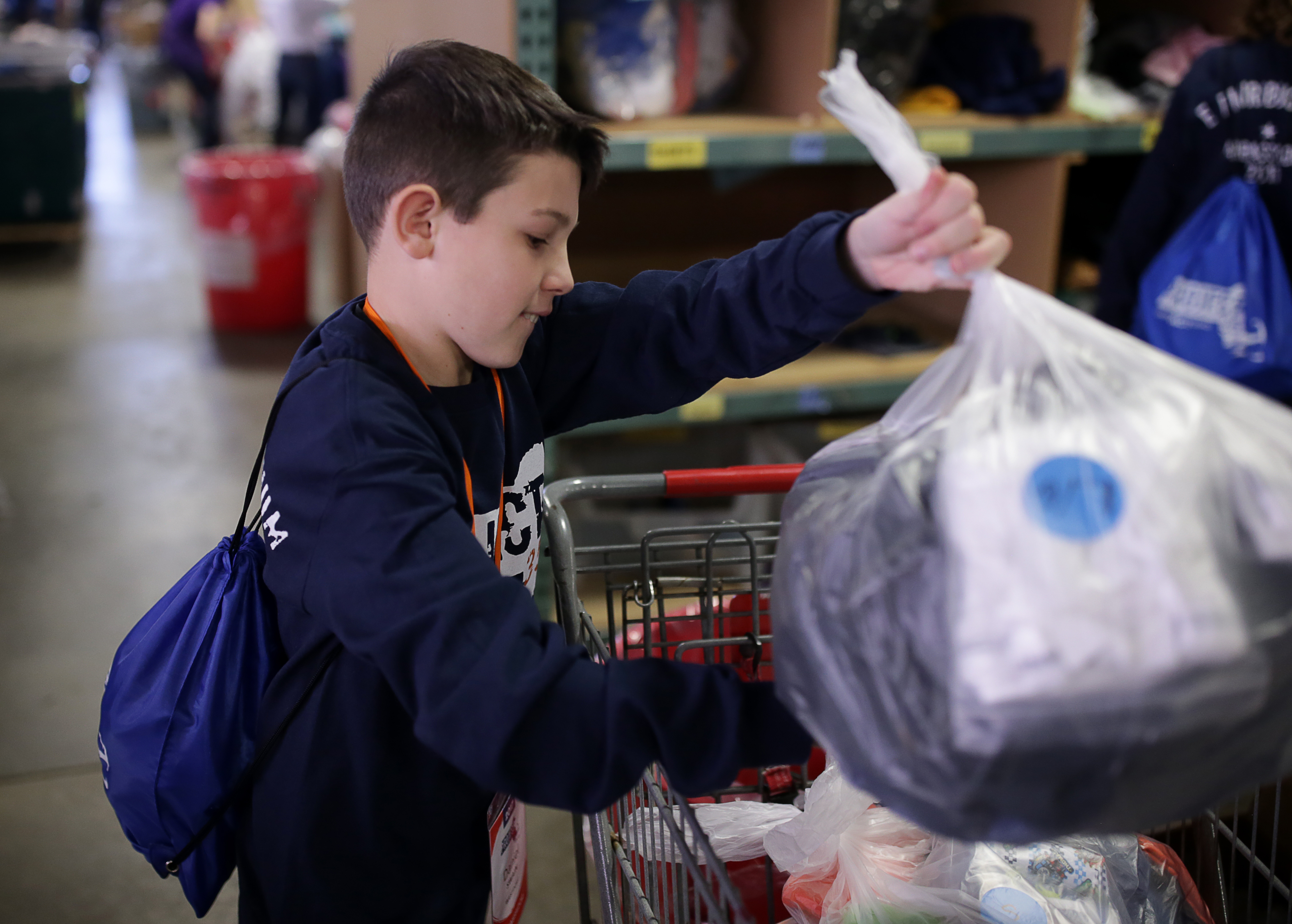 “It’s a good way to spend my Saturday afternoon compared to sitting on the couch,” Daniel Swain of Westport said of volunteering with Project 351.