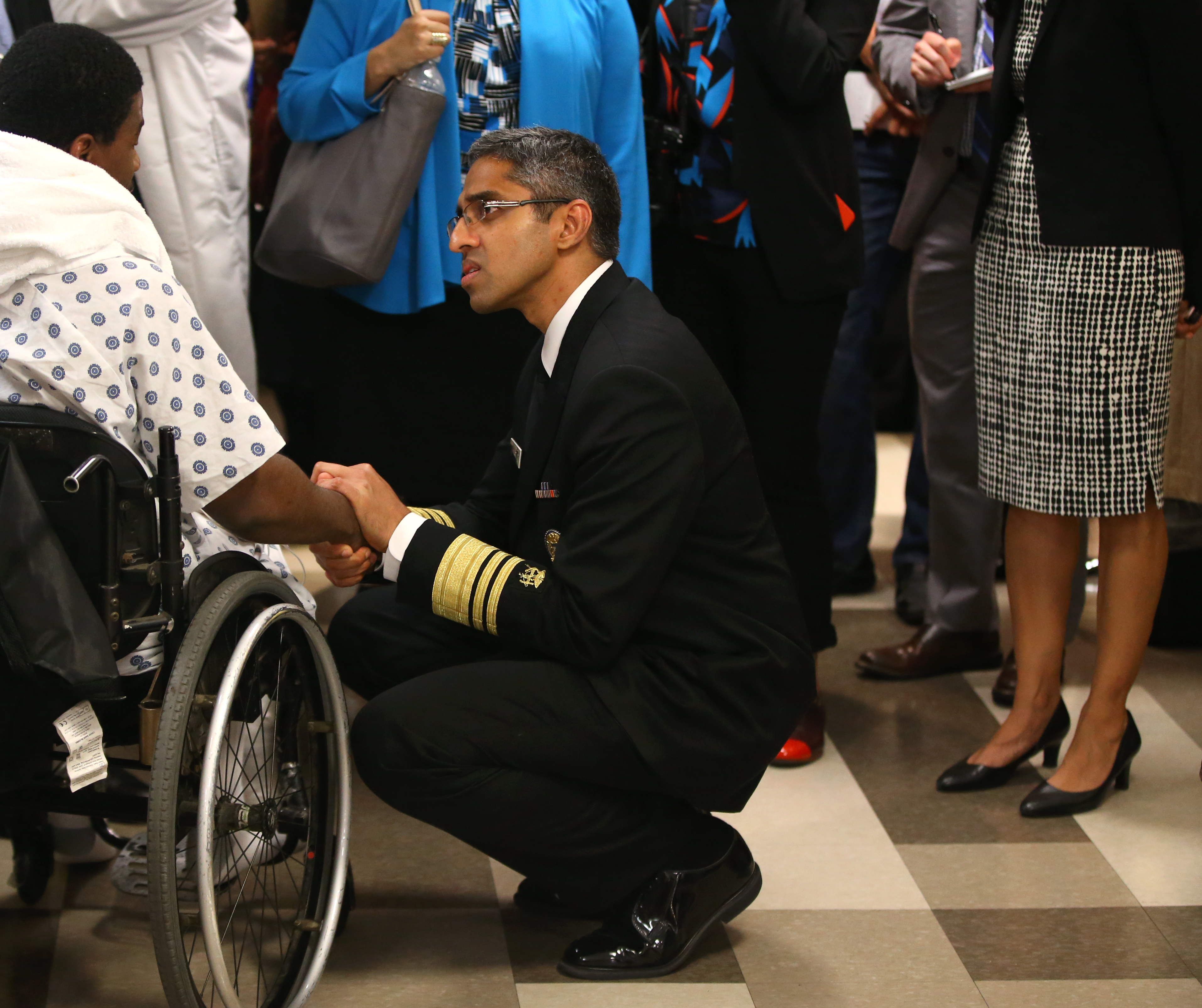 Marcus Sullivan (left) spoke with US Surgeon General Vivek Murthy during Murthy’s visit to the Boston Health Care for the Homeless Program on Albany Street.