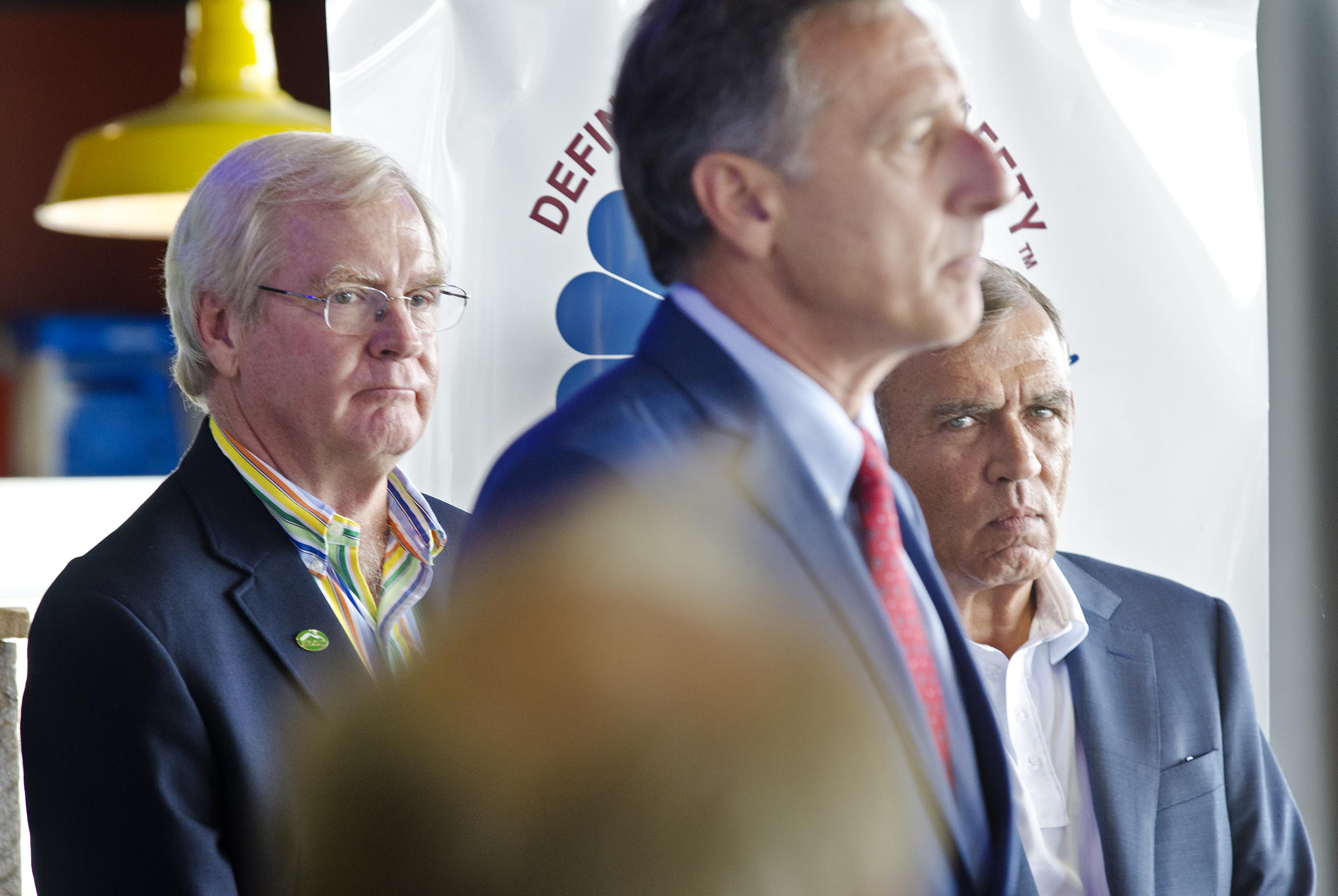 In a 2013 press conference, Jay Peak CEO Bill Stenger (left) and owner Ariel Quiros (right) stand with Vermont Governor Peter Shumlin.