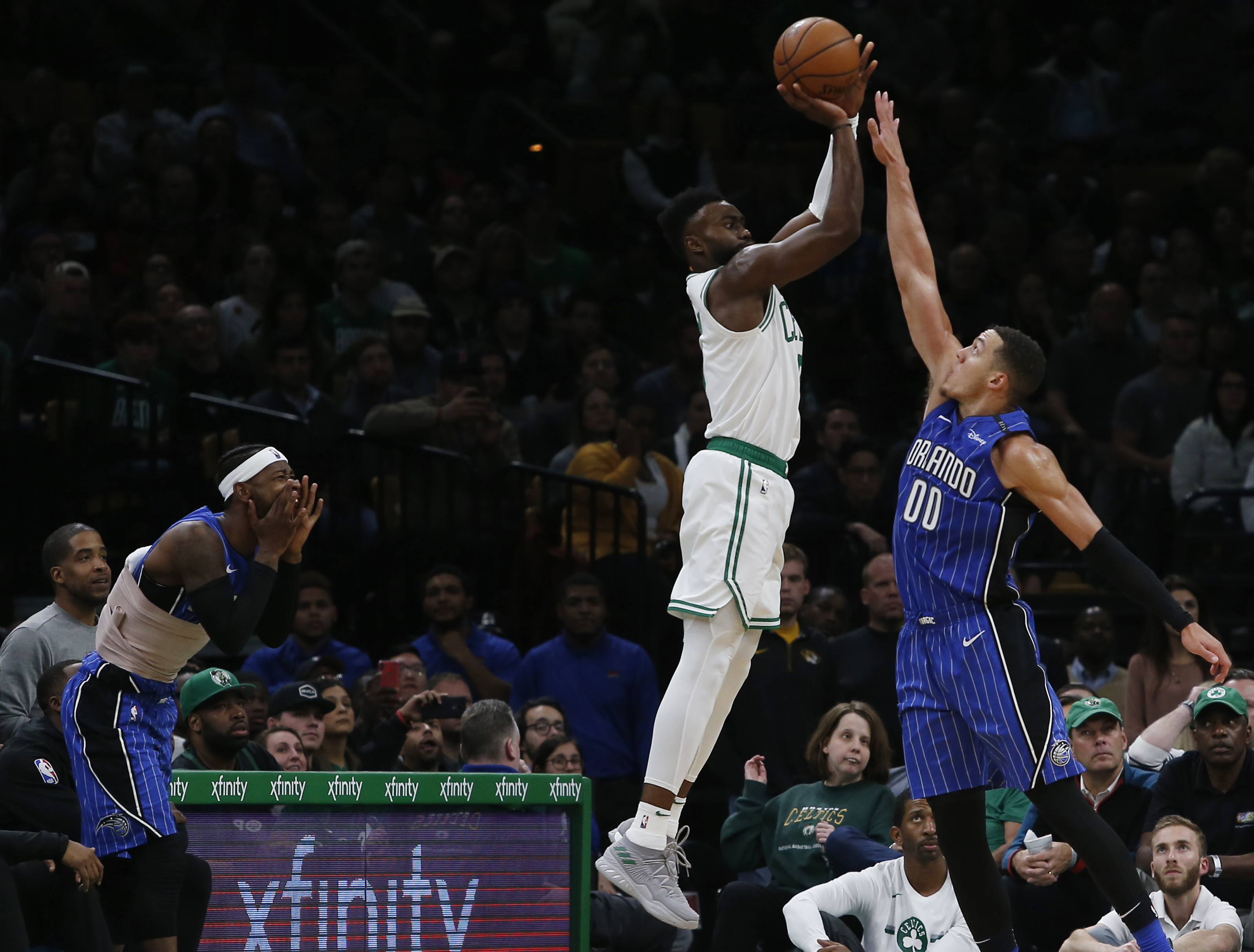 Jaylen Brown shoots a 3-pointer against Aaron Gordon during the second half.