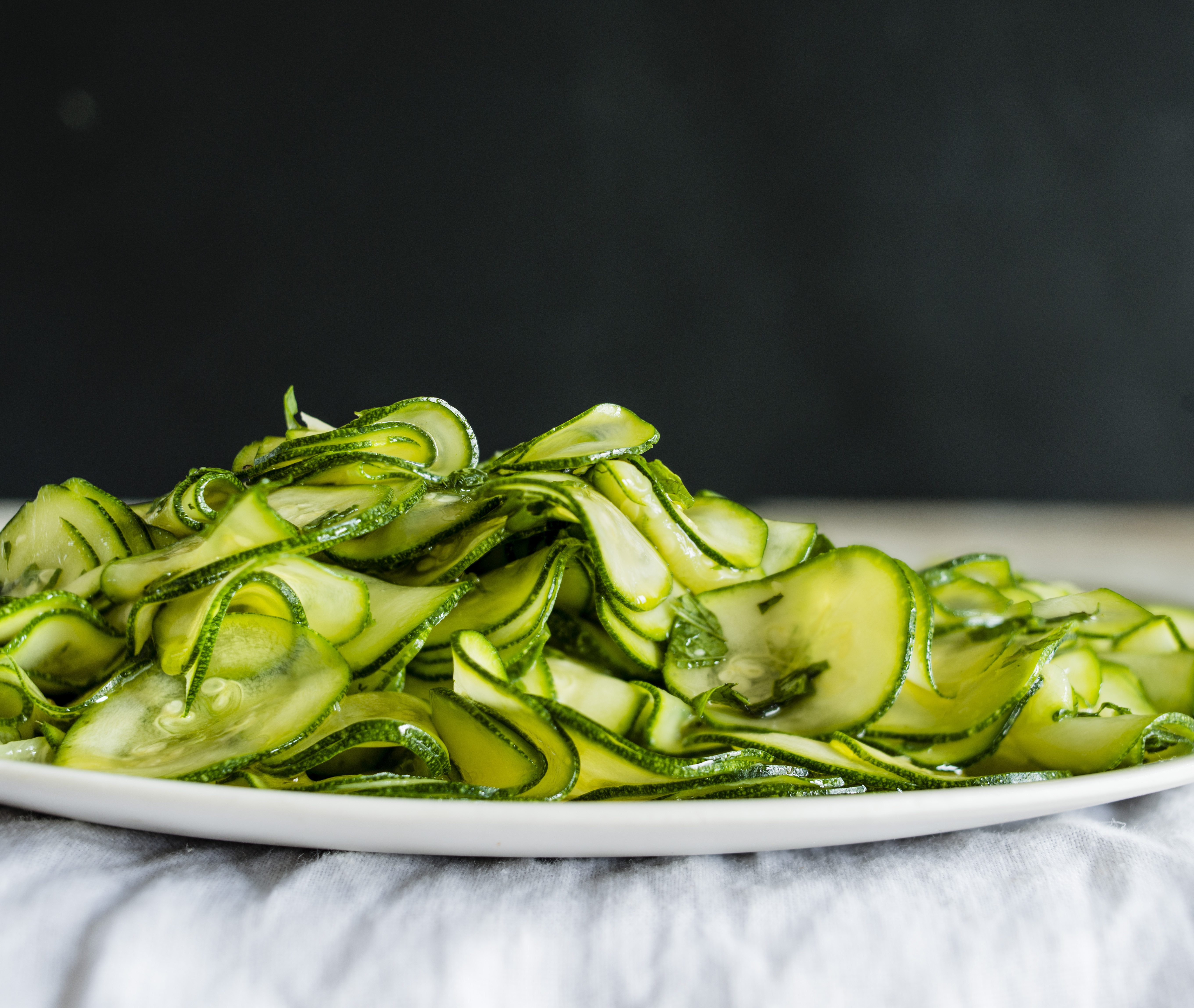 Raw zucchini salad with garlic, basil, and mint.