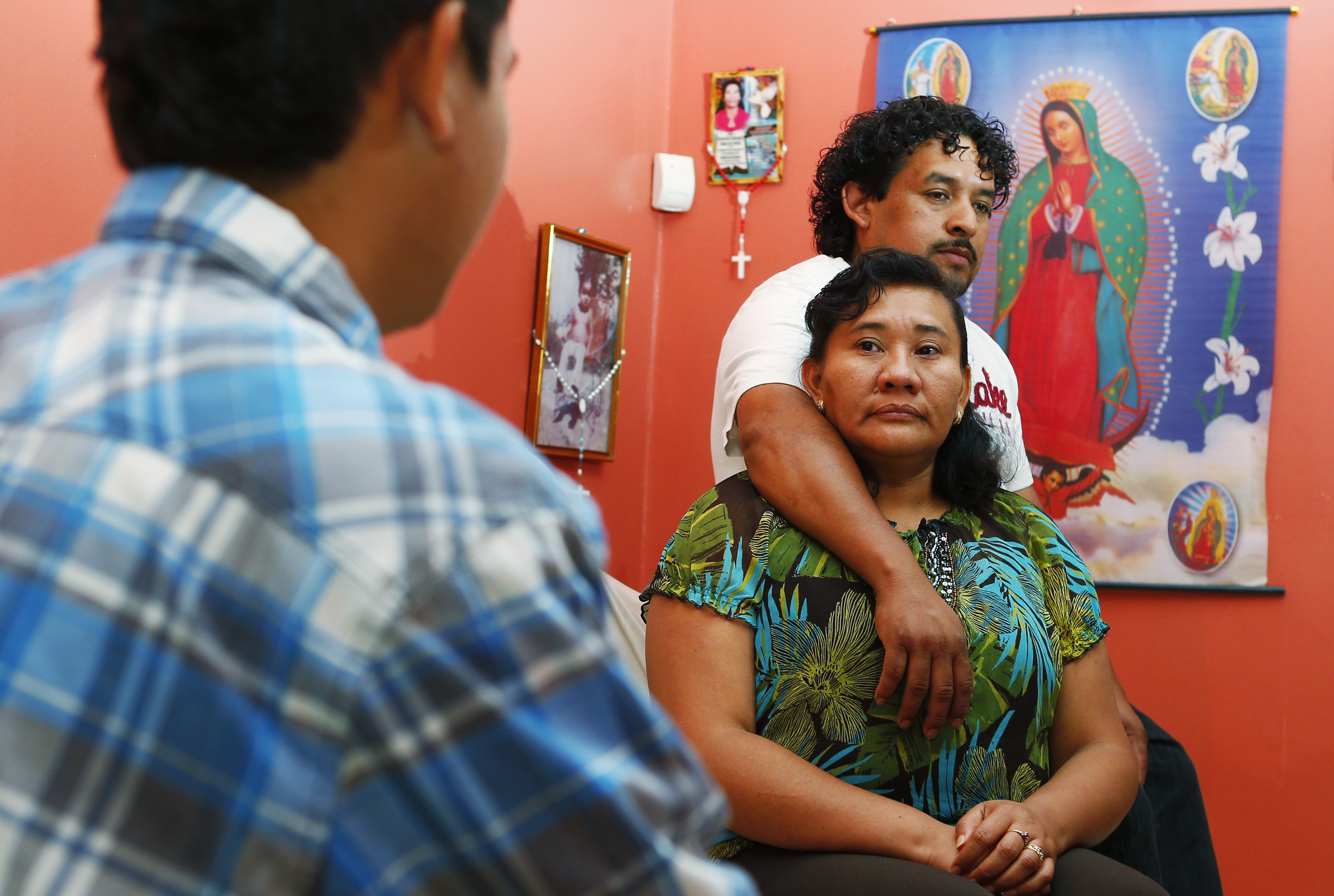 Carlos Ramos and Francisca Alvarado, with their son Carlos. Carlos’s parents, who live in Lynn, are here legally but their son, who moved to the United States in 2012, is not. Gang violence contributes to an high murder rate in El Salvador.