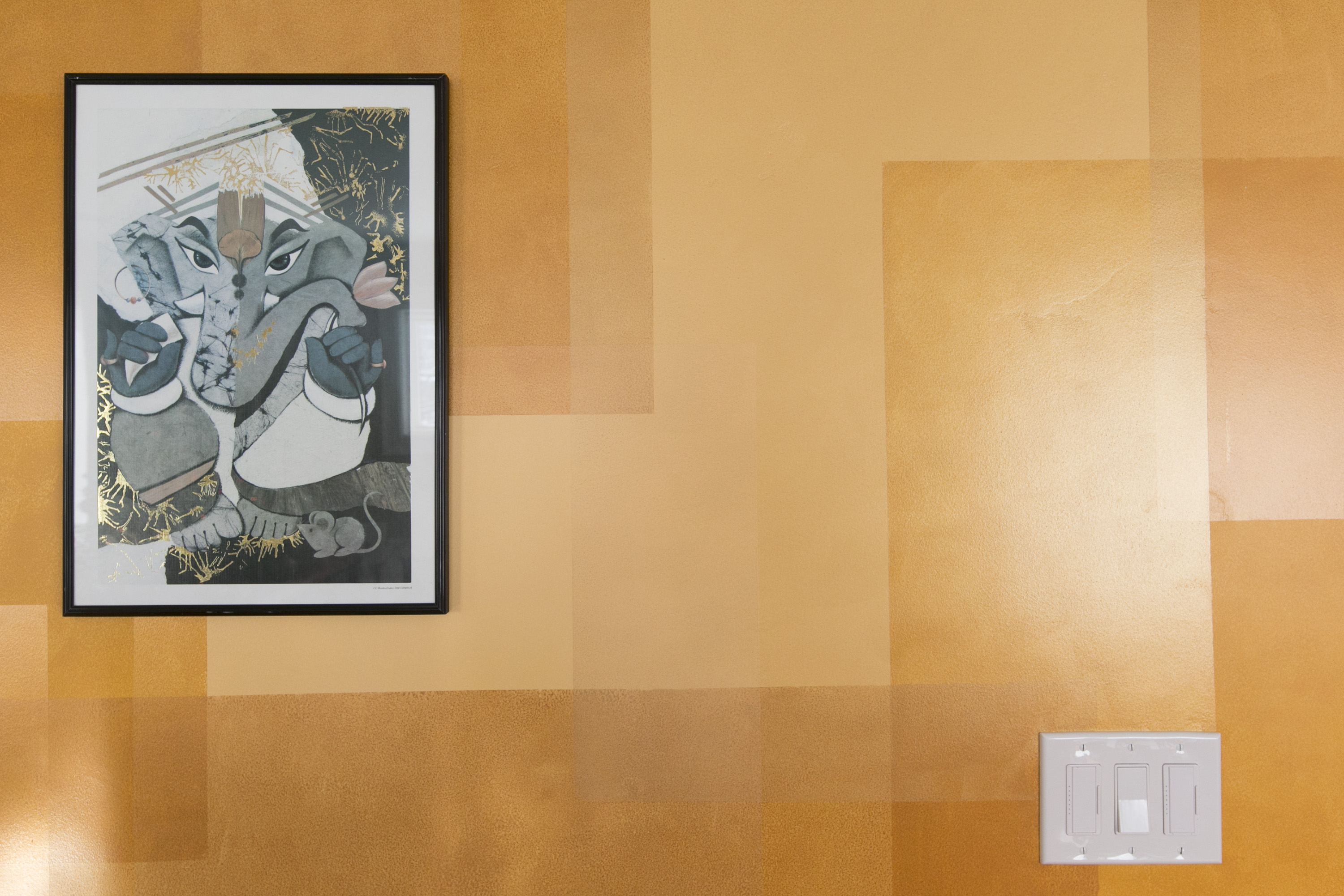 The Hindu deity Ganesha looks on the main entrance as a remover of osbstacles.