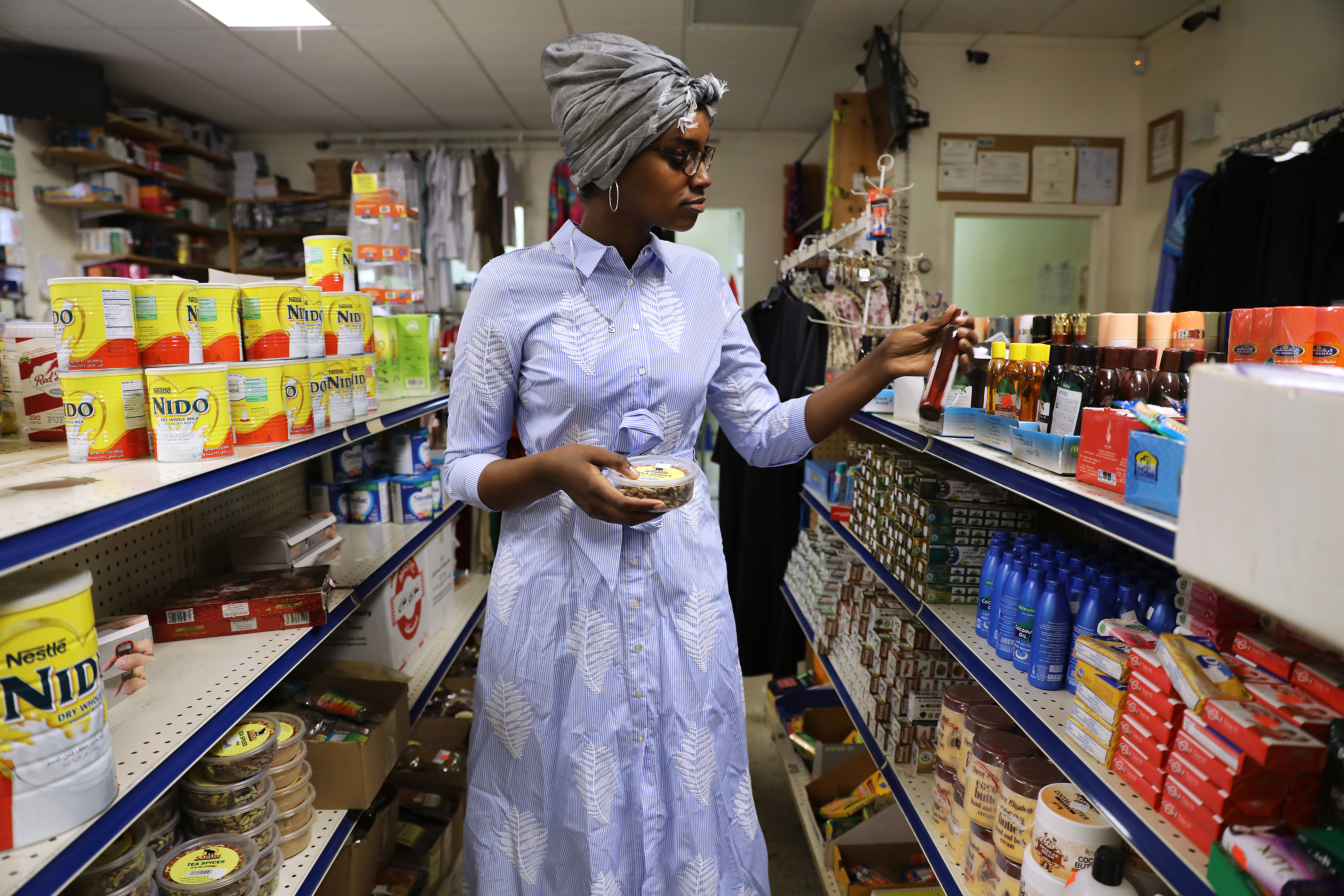 Shadia Abdulahi, 19, a graduate of the Edward Little High School, shopped in Global Halal Market in Lewiston.