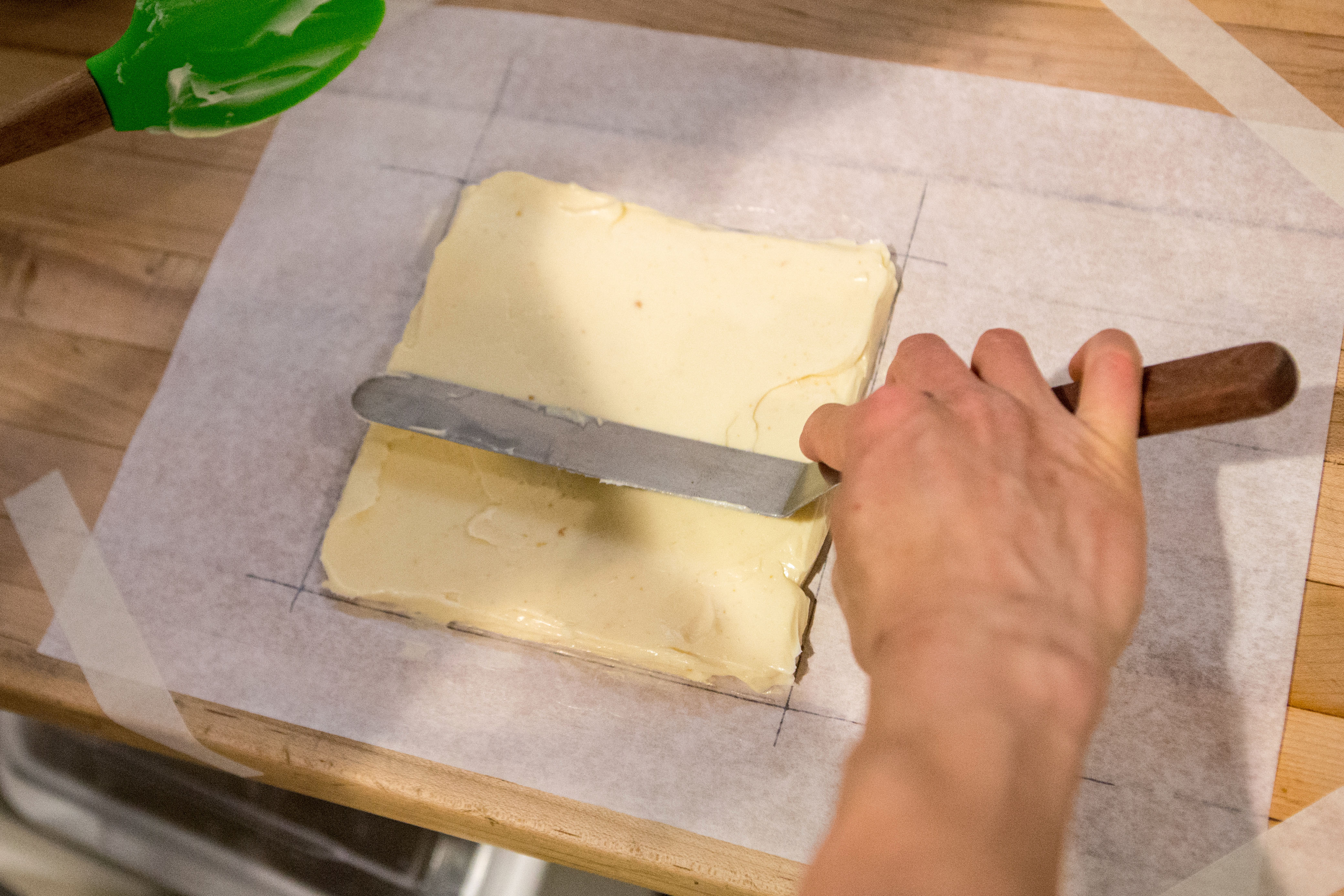 Butter placed on measured square.