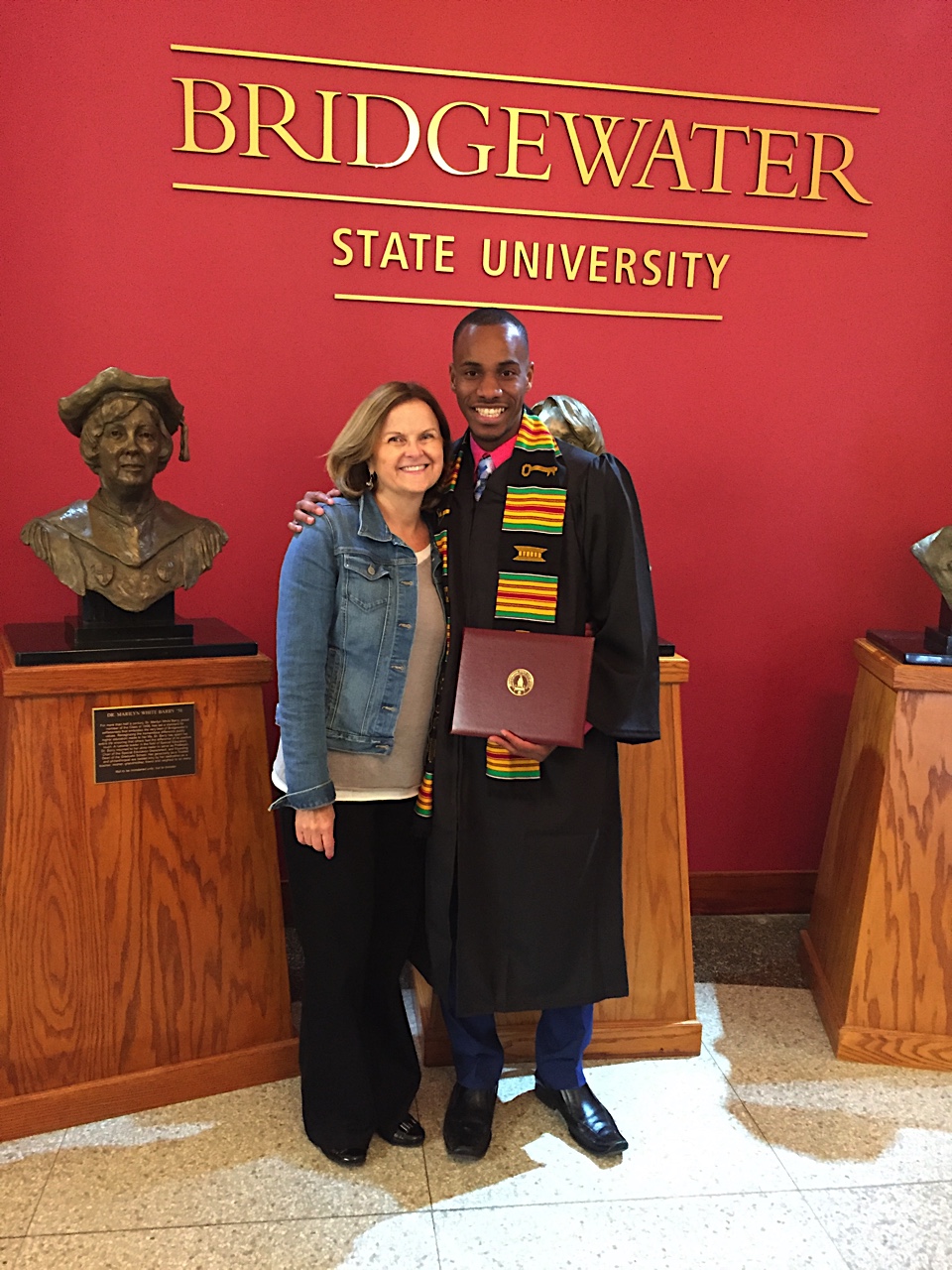 Cheryl Opper and Lorenz Marcellus at graduation from Bridgewater State University on May 13.