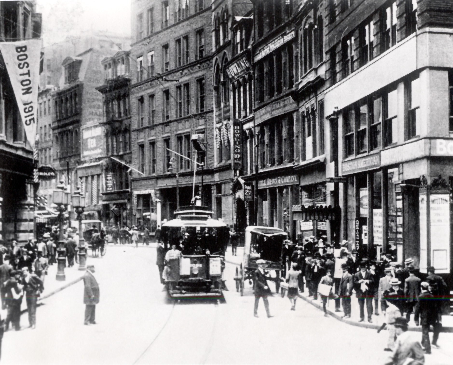 This postcard shows Newspaper Row along Washington Street in 1915, looking much as it did in 1916, when Boston had 10 daily newspapers, most of them clustered between what are now Downtown Crossing and Government Center. Car 393, which never reached its destination that night, was due to turn around near Washington and Summer streets, two blocks south of here.