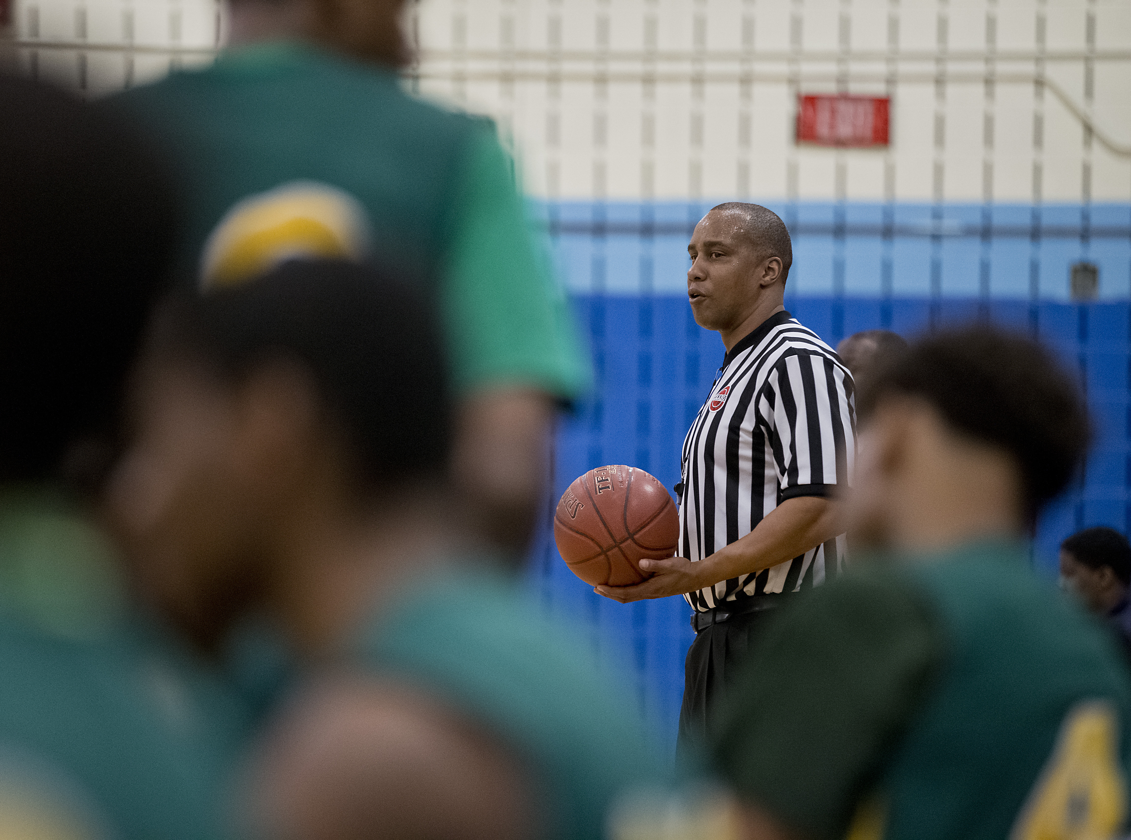 Jahmahl Galloway worked a game between Boston English High and Snowden High School in Boston on Dec. 12.