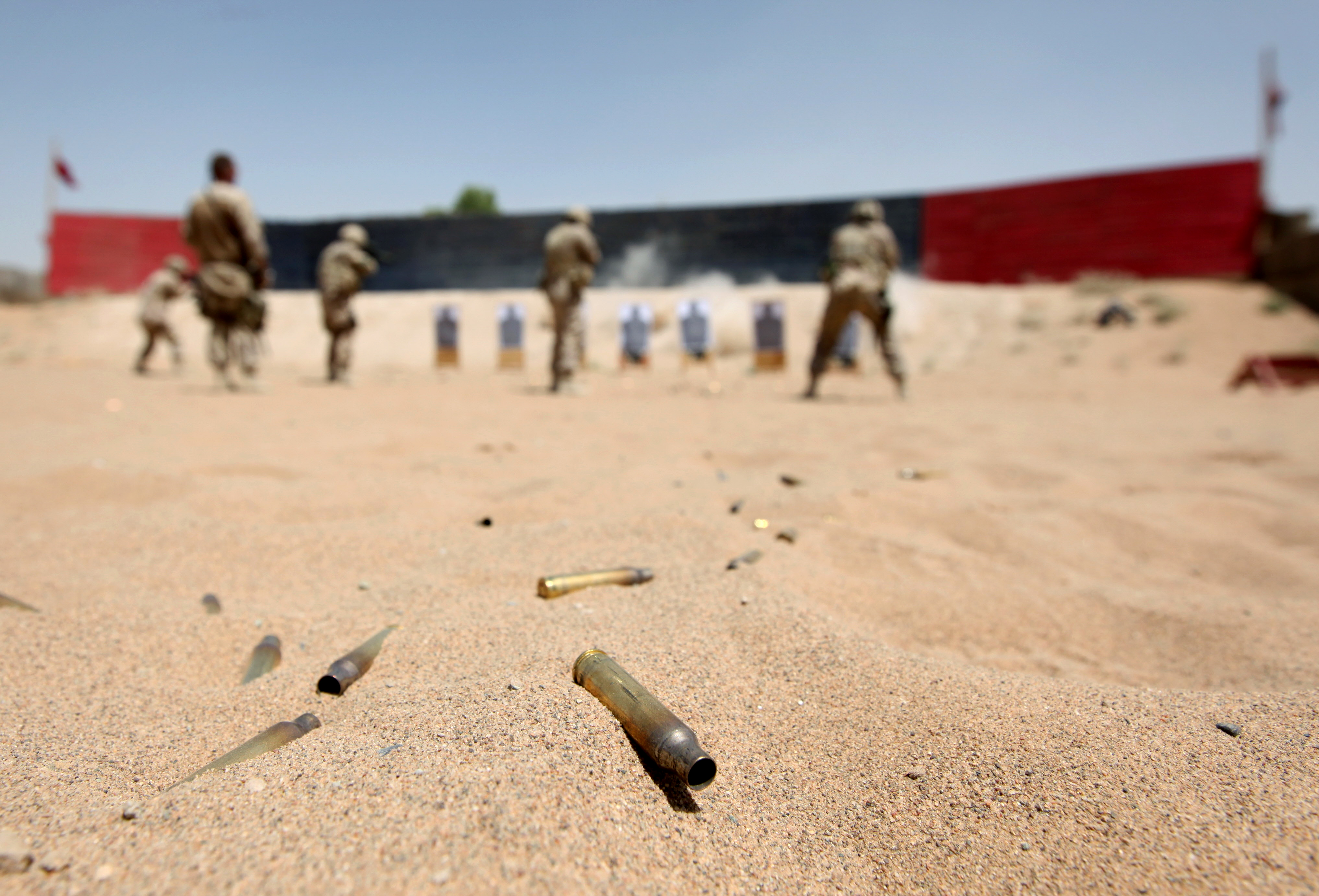 Cartridges lie in the sand as Canadian Task Force Kandahar soldiers take part in a shooting exercise at Camp Nathan Smith on June 7, 2010.