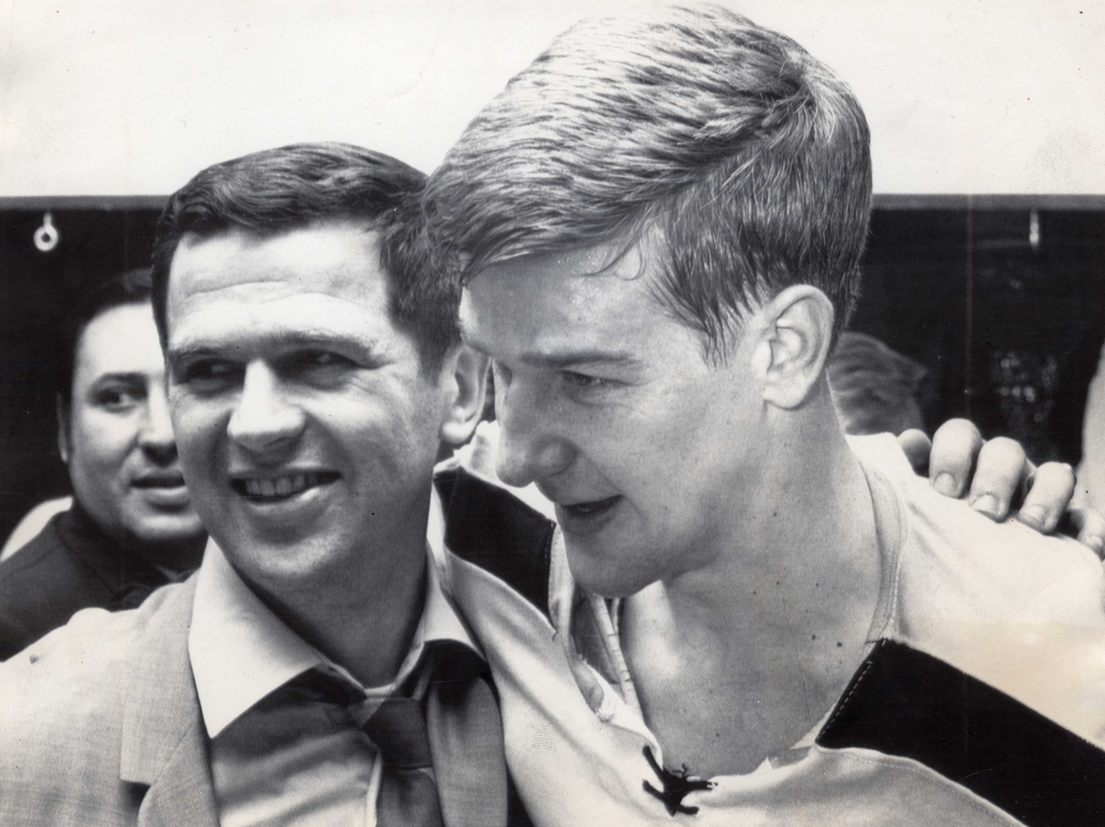 Harry Sinden congratulates Bobby Orr after a 1969 playoff win.