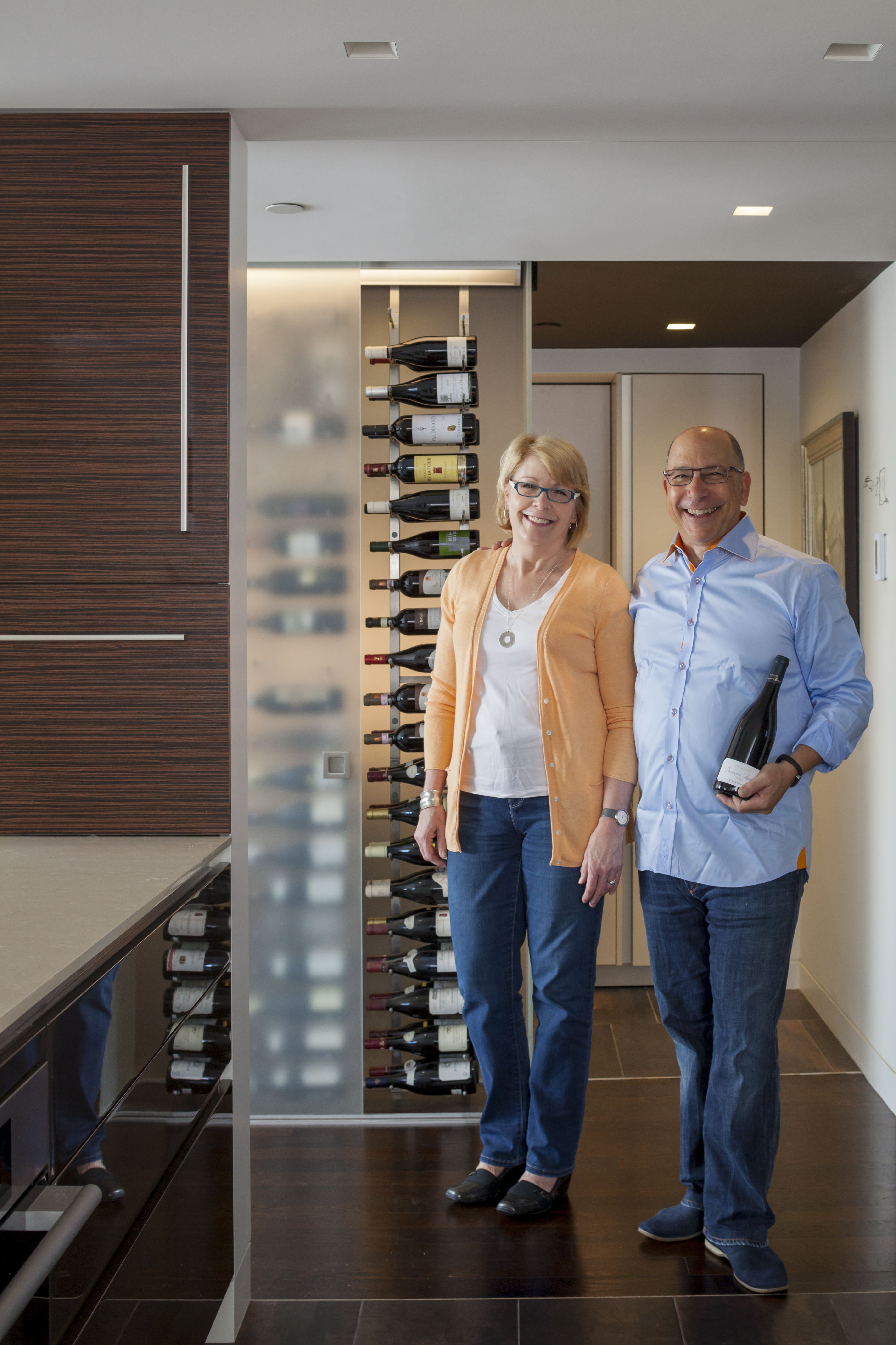 Mary Rivet and Chris Meyer’s sleek new kitchen is designed around storage for their extensive wine collection.