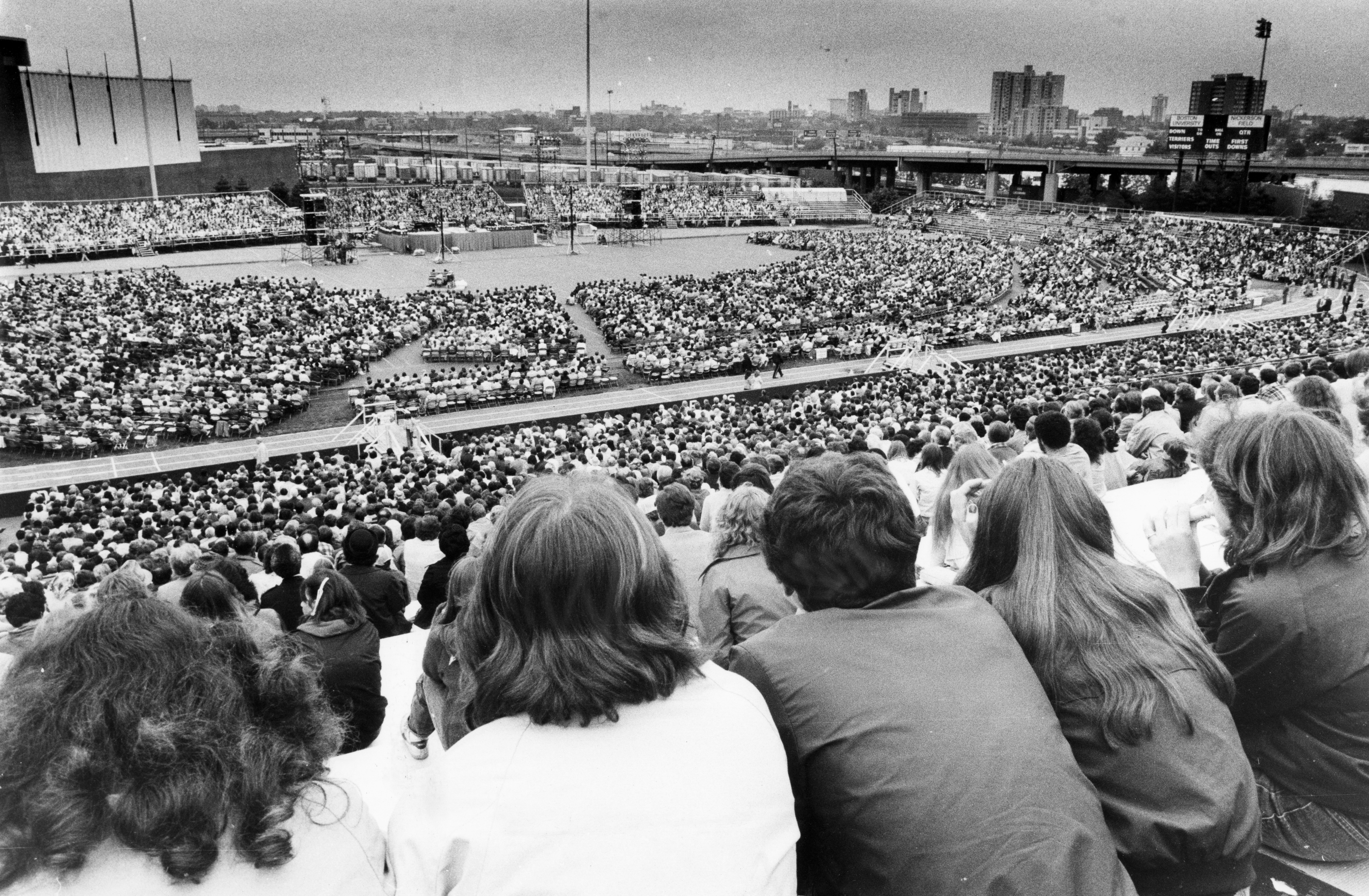Thousands filled Boston University’s Nickerson Field for the first day of Reverend Billy Graham’s eight-day crusade in Boston on May 30, 1982.
