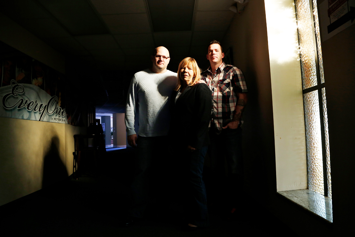 Lorraine Hawks and her sons Gene (left) and Joe at Bethel Church in Tampa, where she and her husband, Paul, were active members and where Paul had been saved in 1989.