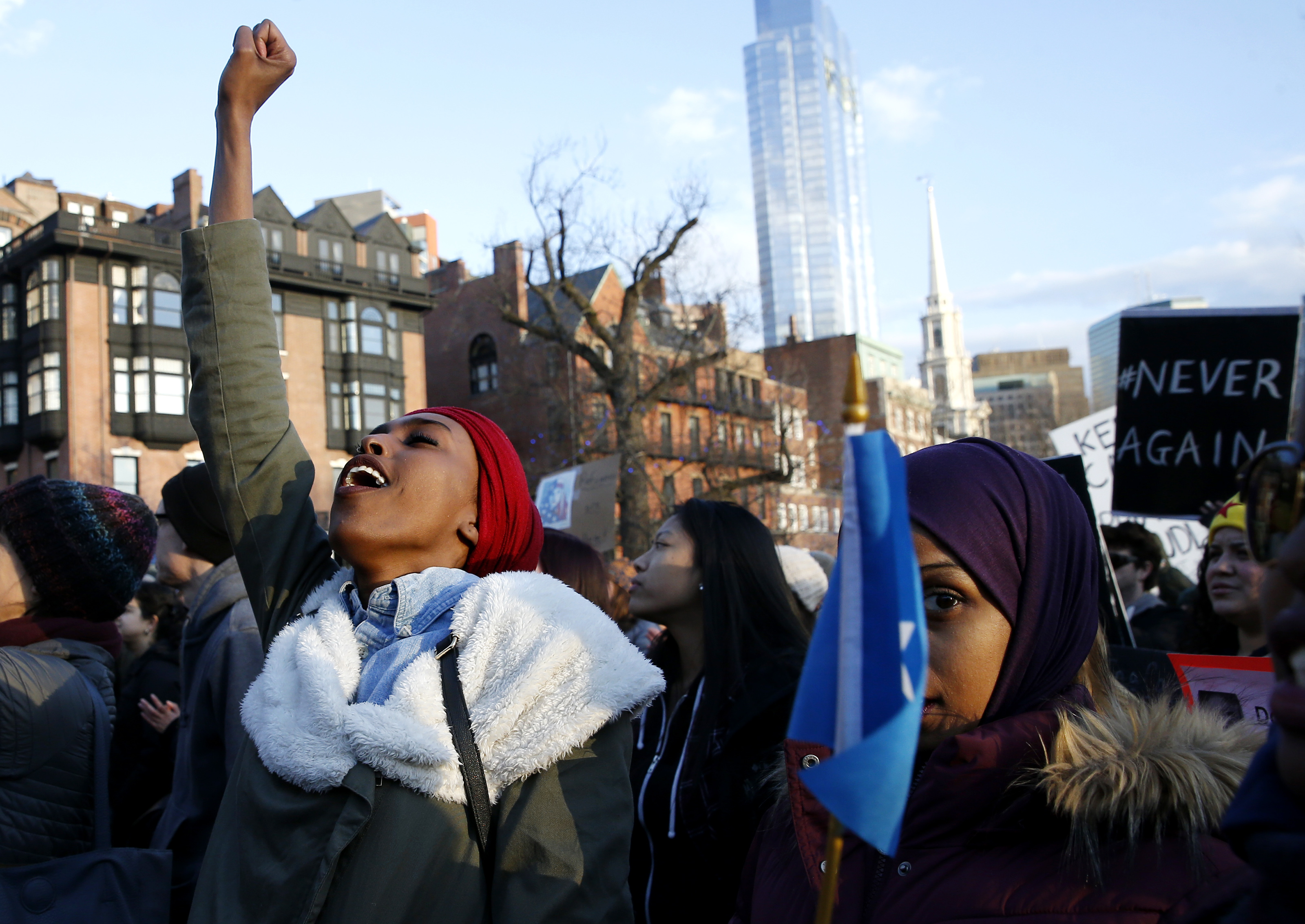 Protesters gathered near the State House Sunday afternoon.