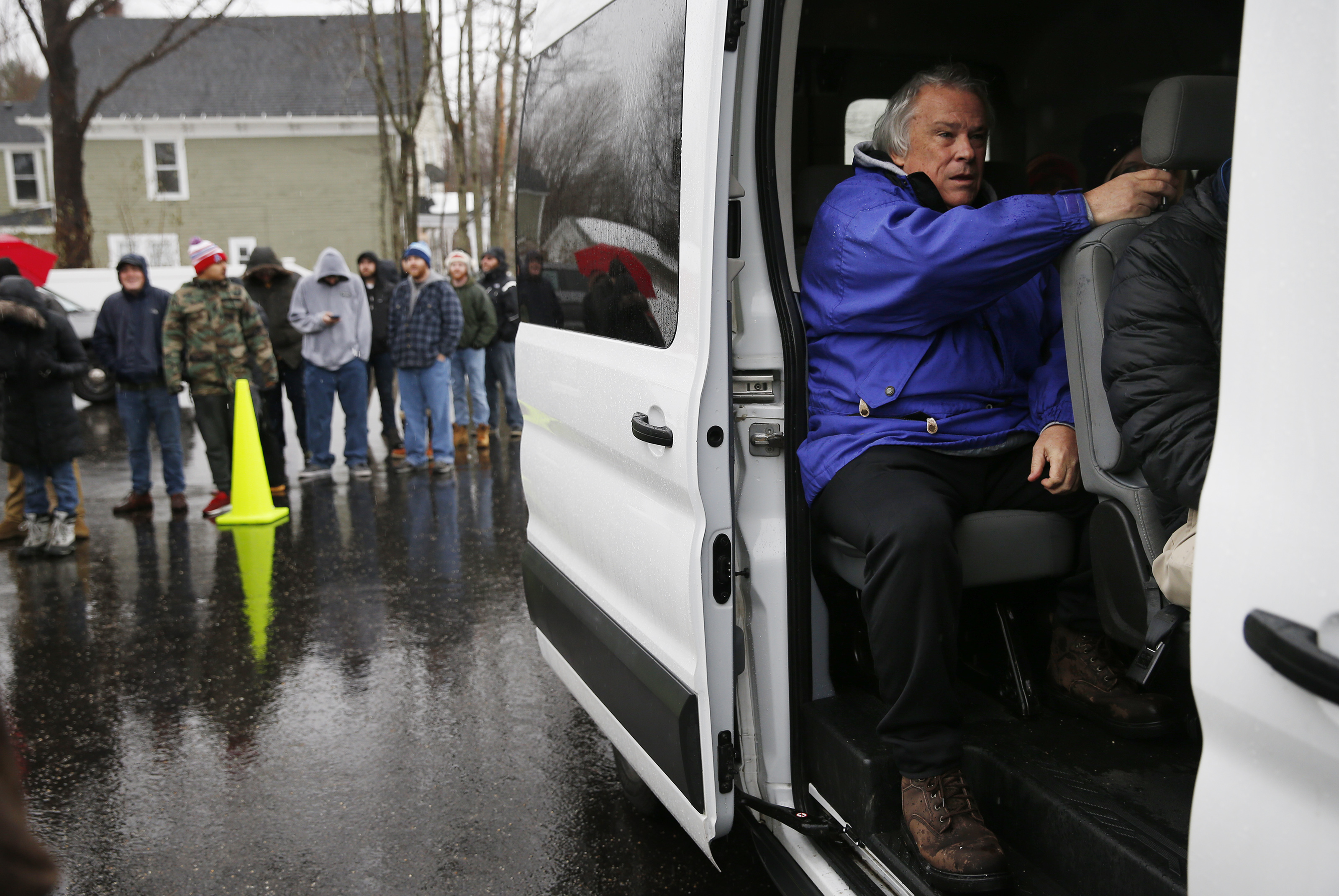 John Egan on waited for the shuttle to bring him back to the parking lot after purchasing marijuana at the opening of Cultivate.