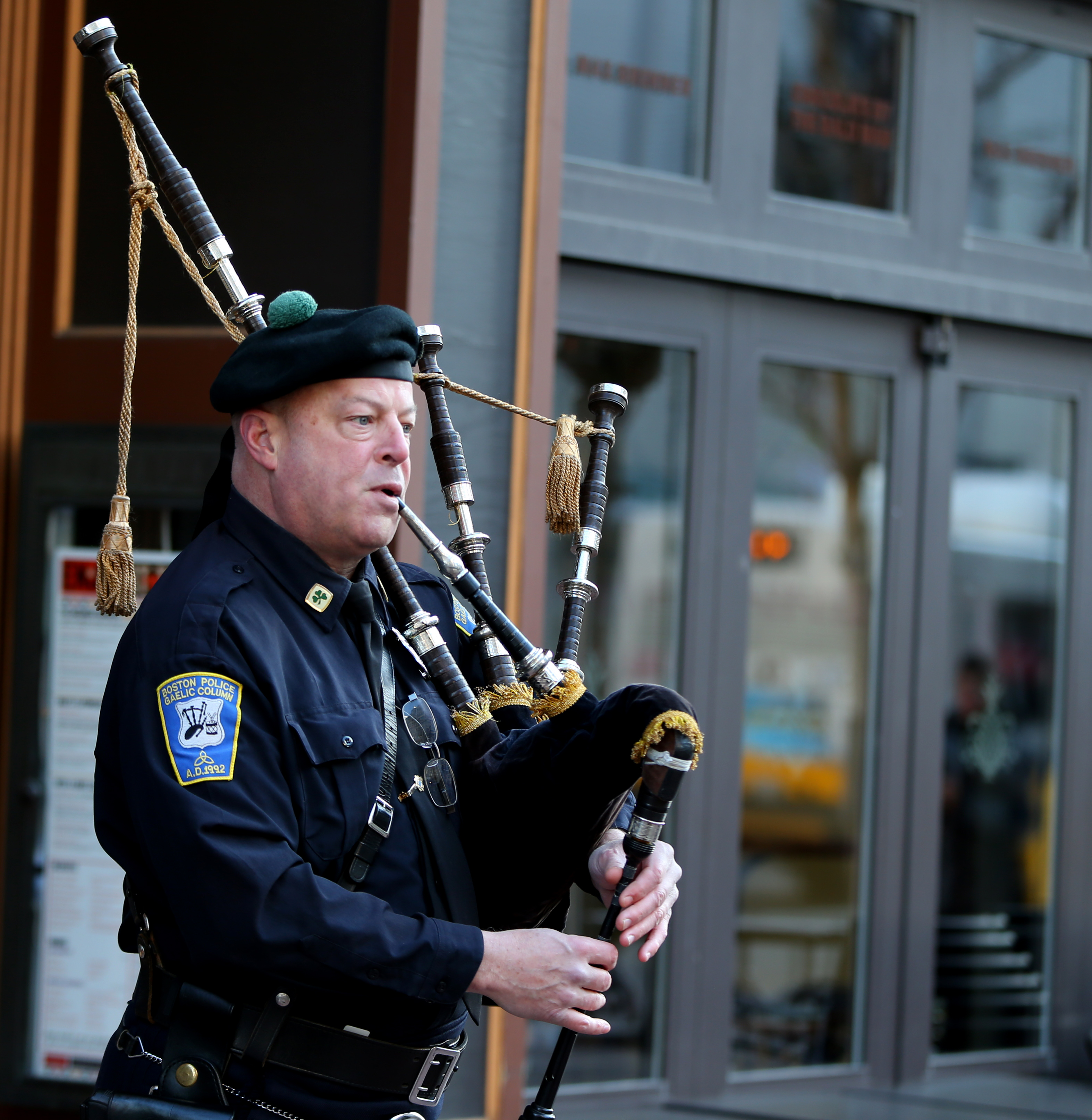 Police Sergeant Detective Tim Horan warmed up before the wreath-laying ceremonies took place on One Boston Day Friday morning.