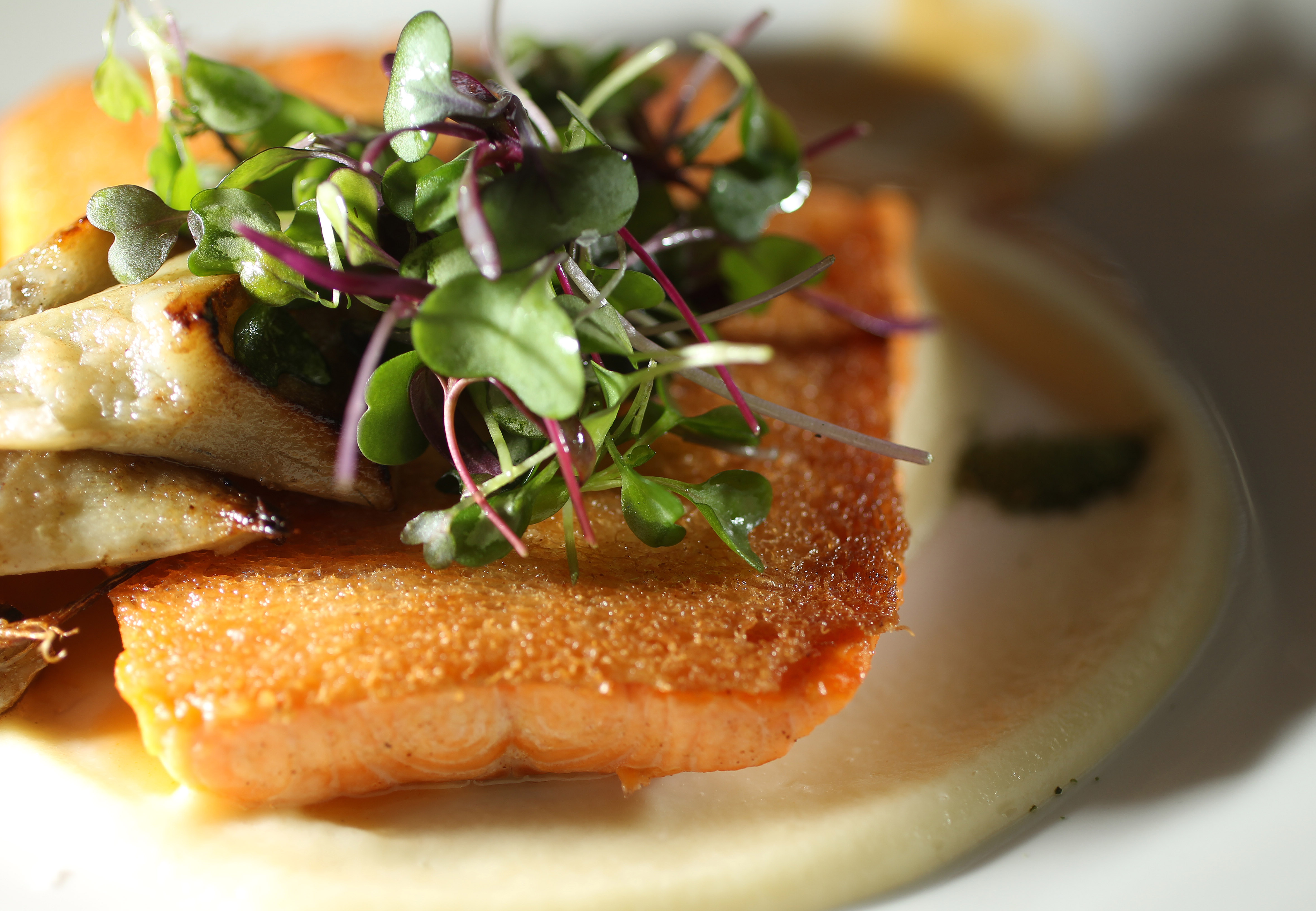 Arctic char is paired with artichokes.