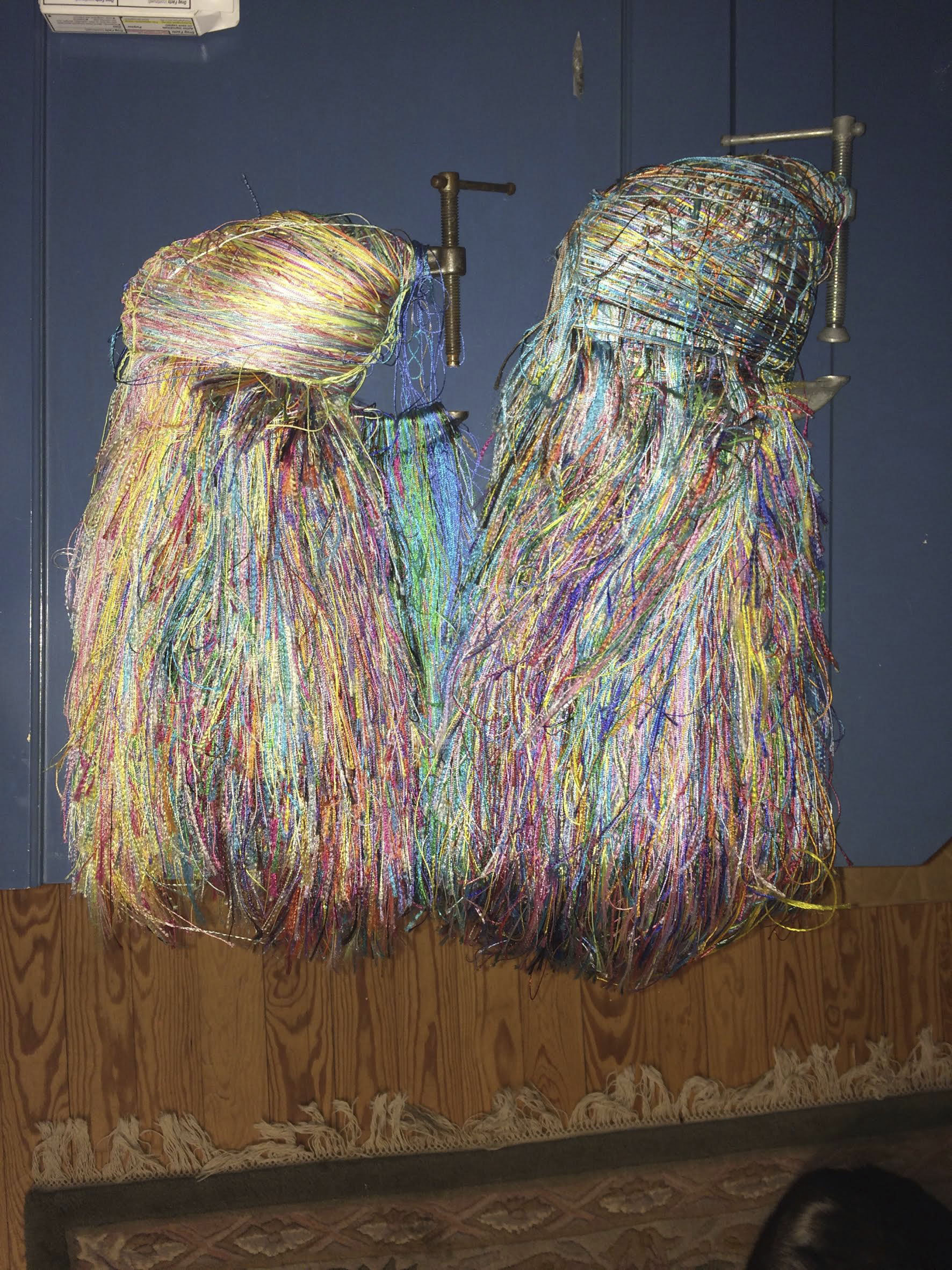 Ms. Ahlbeck’s work area for tying her reeds, with colorful threads representing about 25 years of reed preparations.