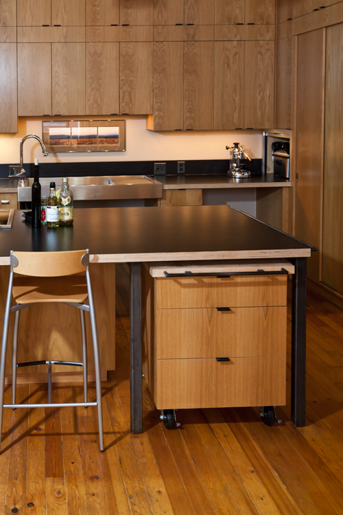 Another example of the functionality of rolling cabinets. “The Accessible Home” (The Taunton Press)