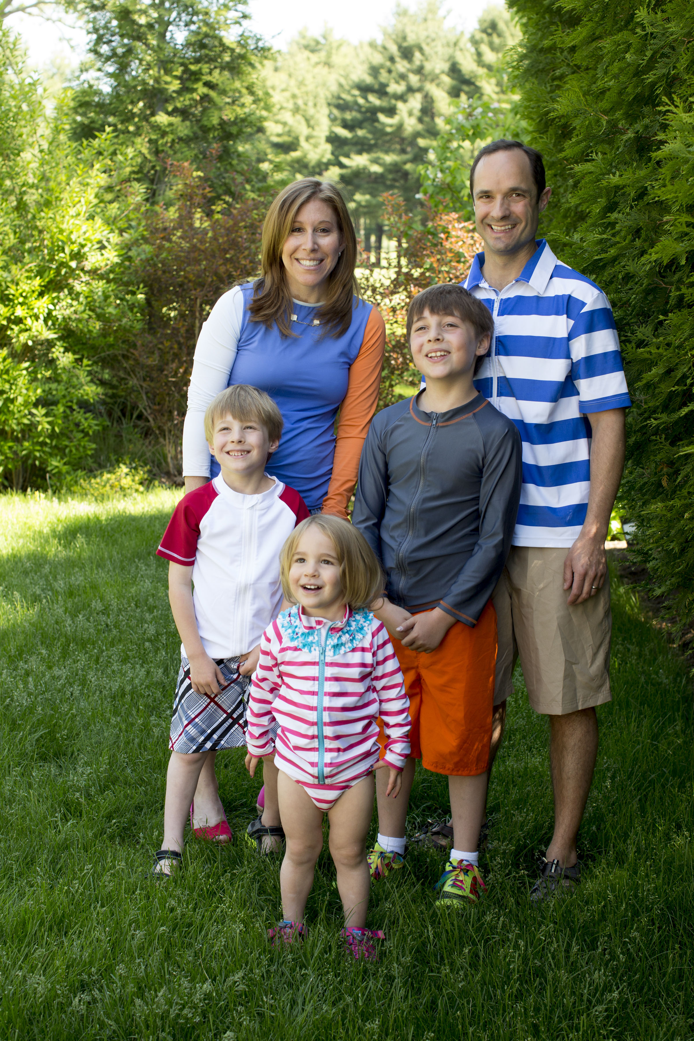 Lisa Levine (with family) favors rash guards from Swimzip.