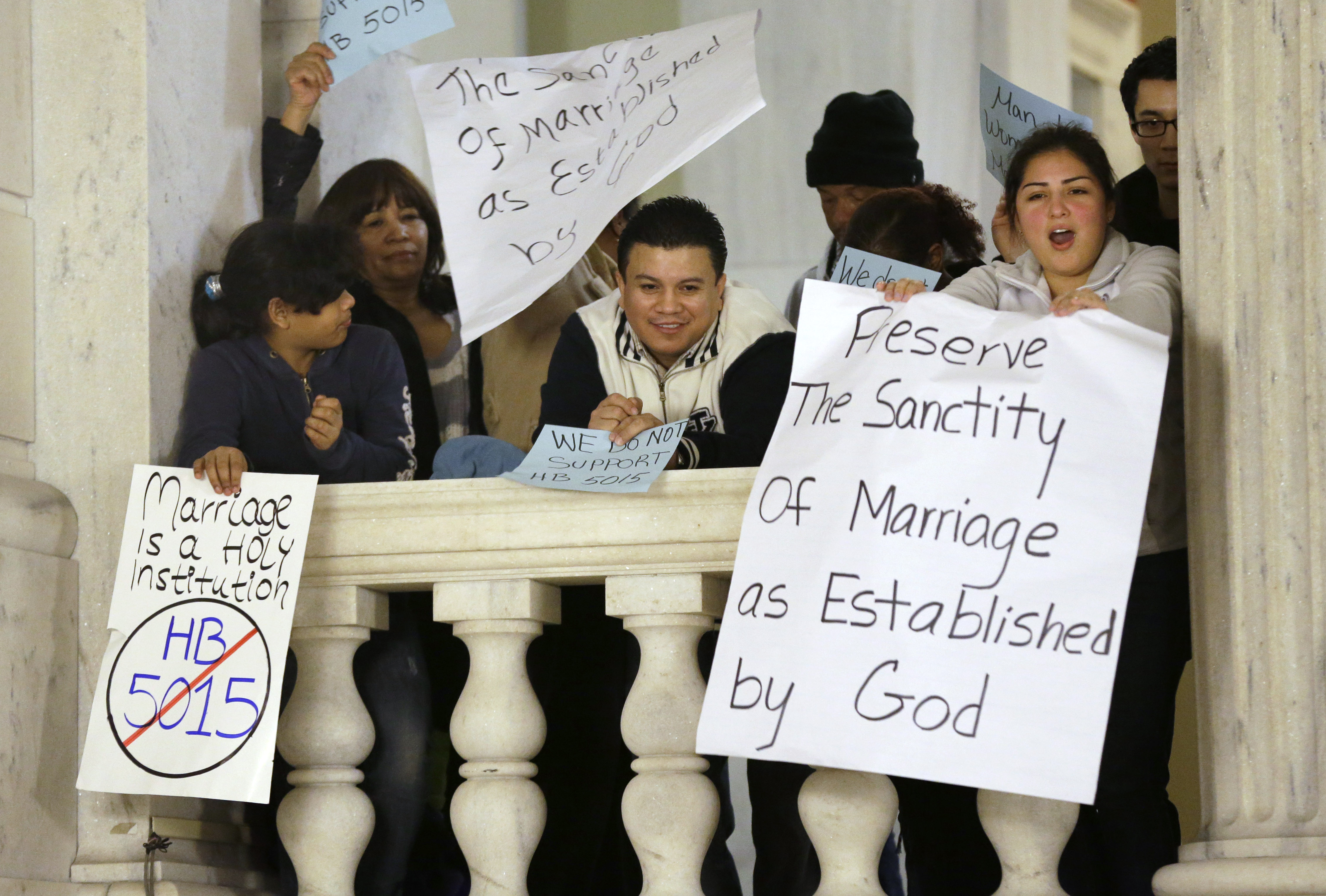 Demonstrators displayed placards and shouted slogans as they voiced their opposition to same-sex marriage during a January rally.