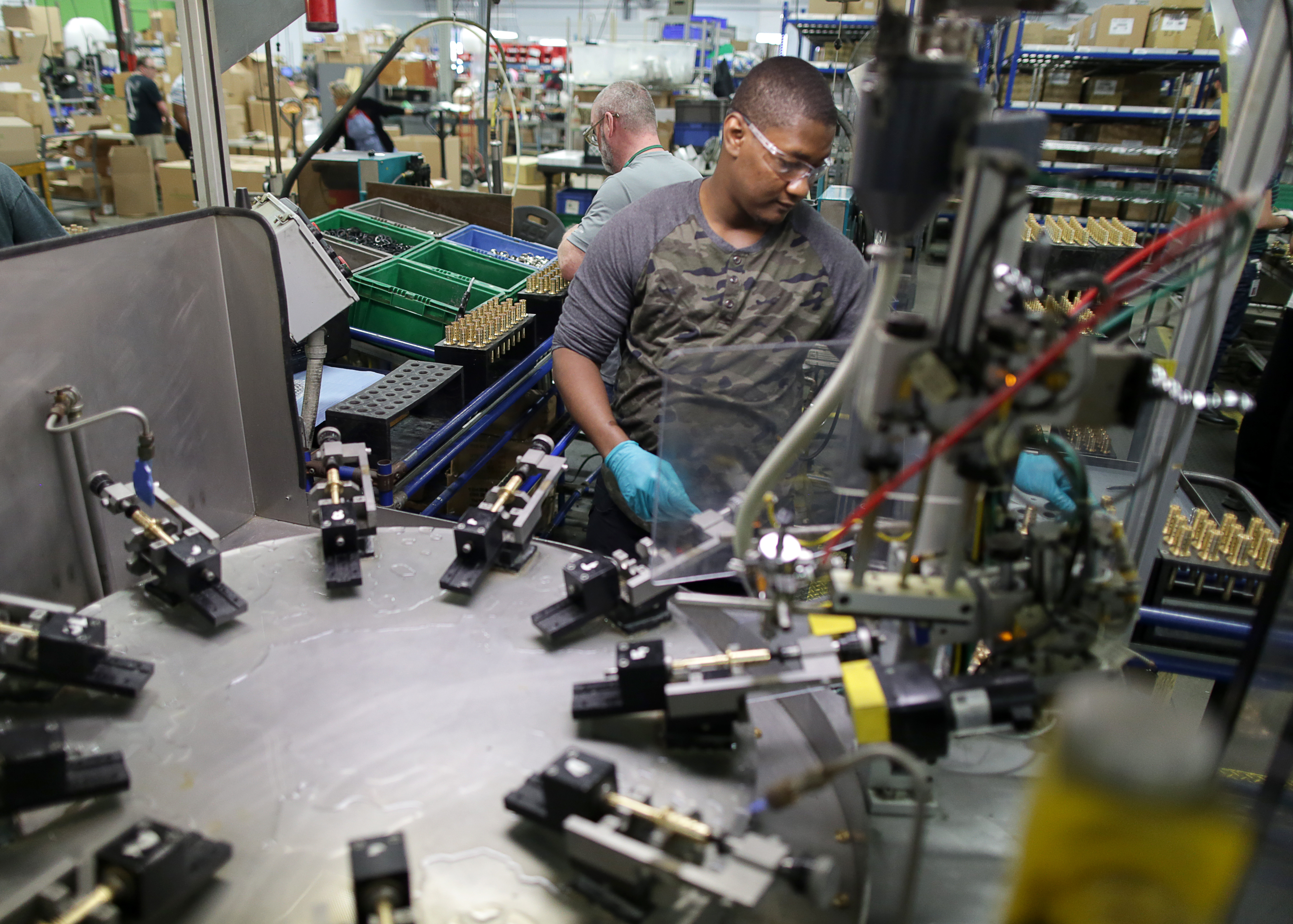 Office dogs, yoga classes, good pay — welcome to the modern Mass. factory -  The Boston Globe