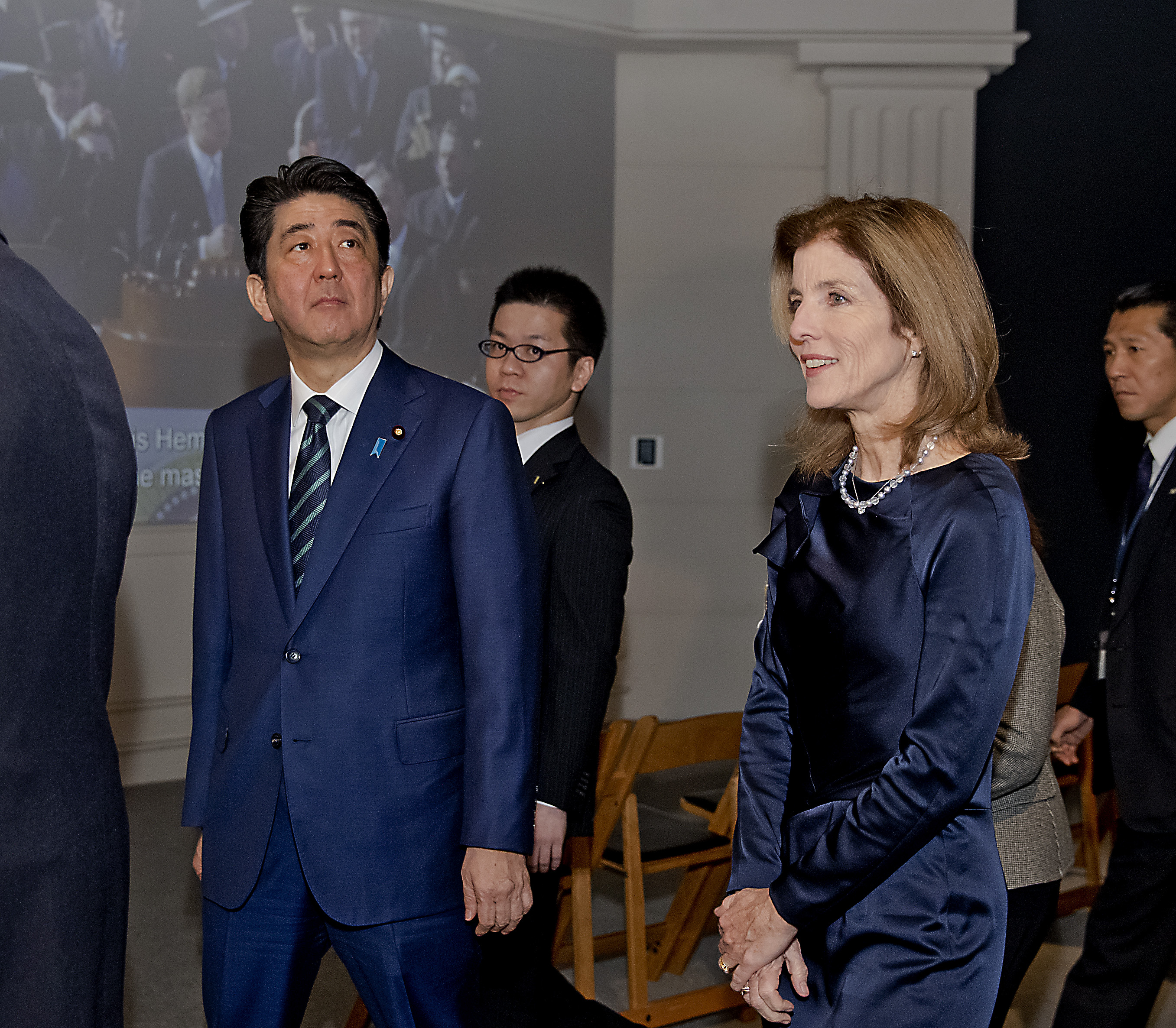 US Ambassador Caroline Kennedy led a tour of the JFK Library for Japan's Prime Minister Shinzo Abe (left) on Sunday.