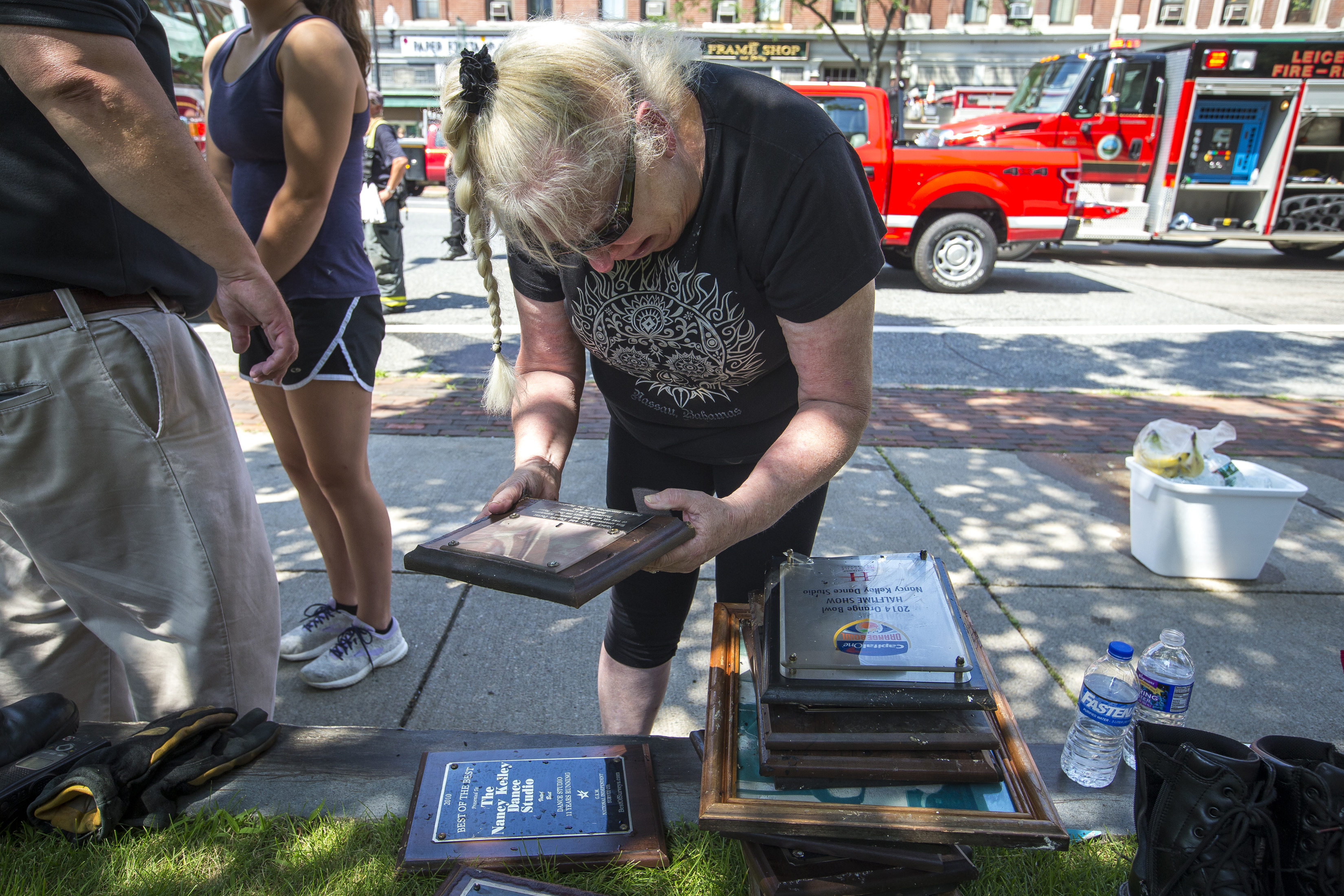 Nancy Kelley looked through personal belongings from her business, the Nancy Kelley Dance Studio.