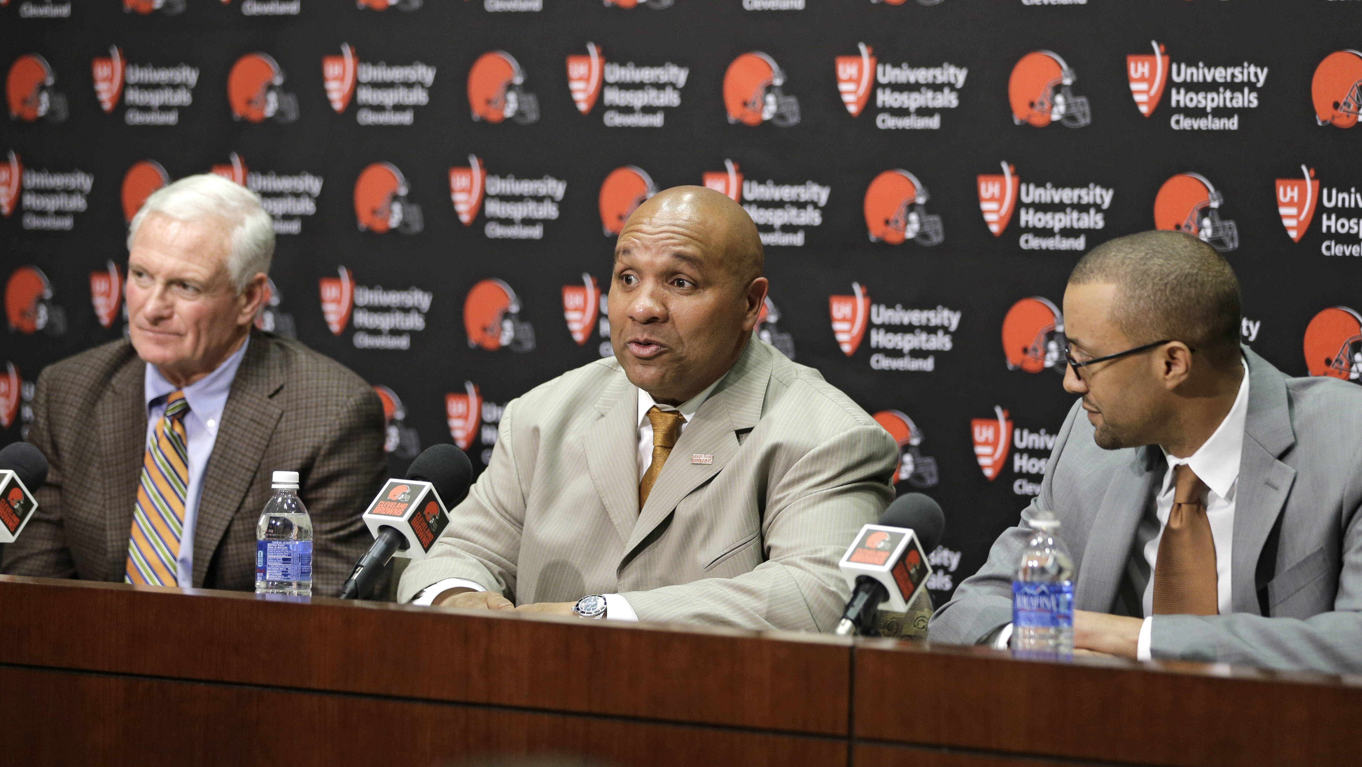 Jimmy Haslam (left) brought on Hue Jackson (center) as coach and Sashi Brown as executive vice president of football operations.