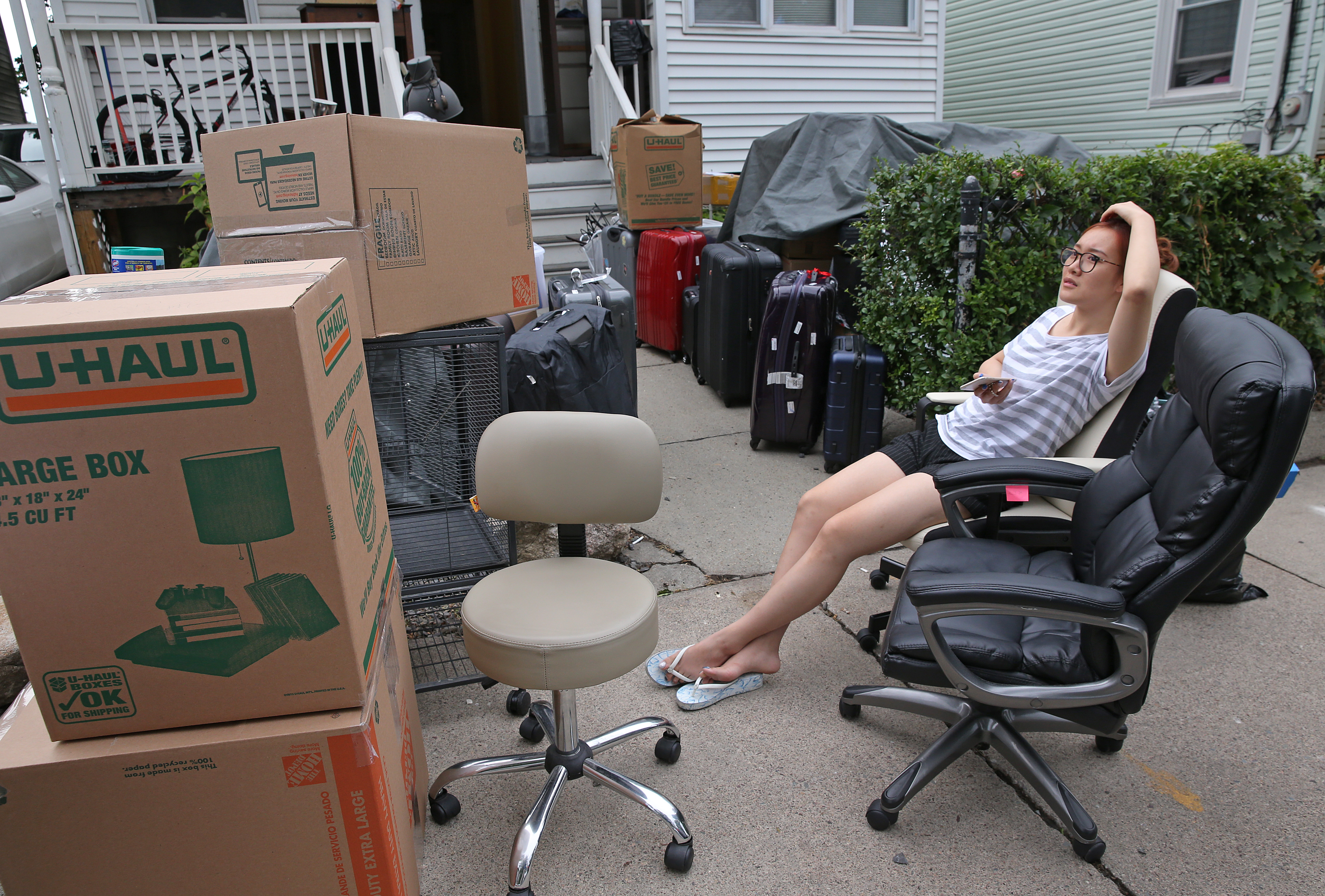 On Wadsworth Street, Boston University student Lina Guo took a break while moving.