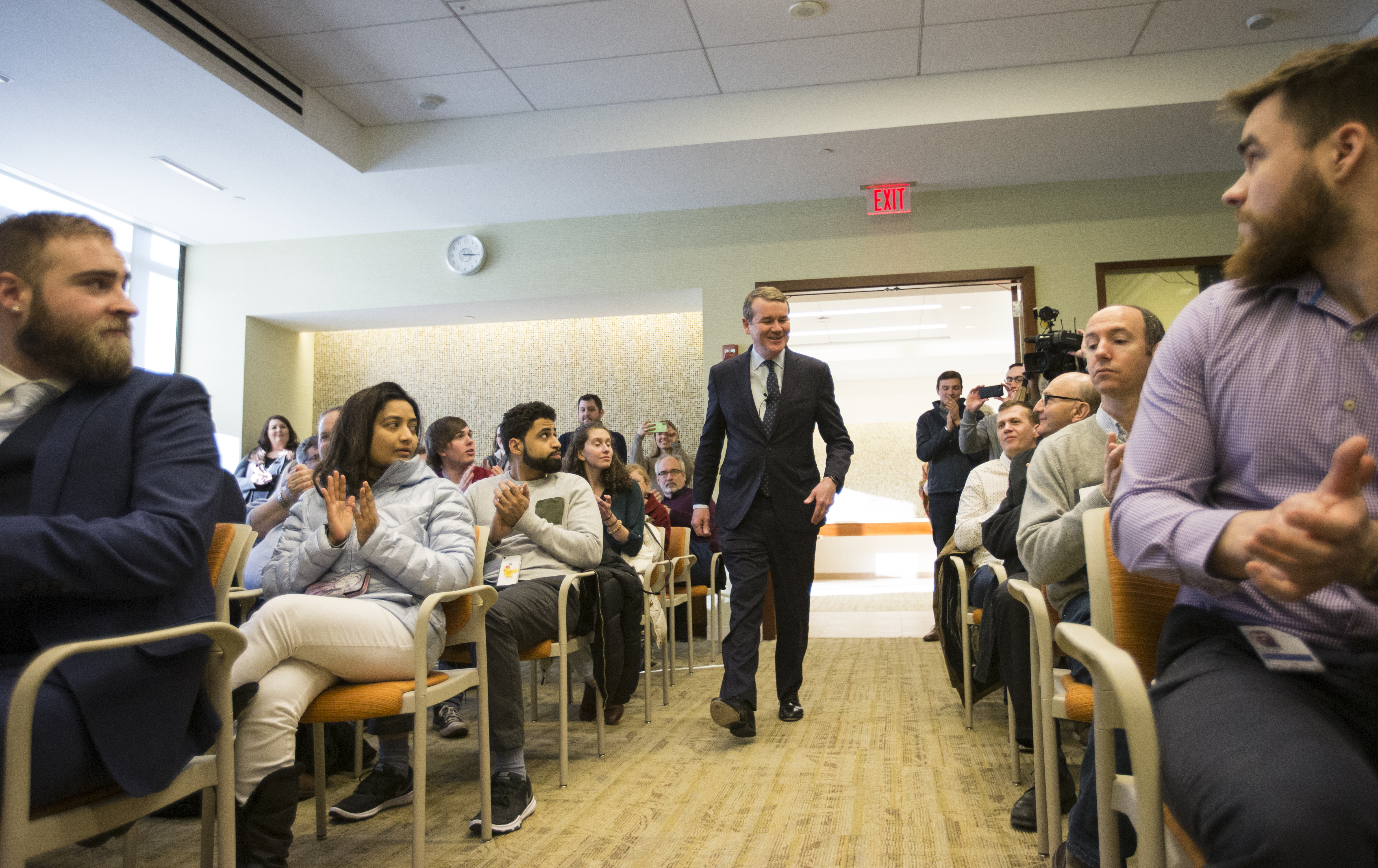 Senator Michael Bennet of Colorado entered a town hall at the Fidelity Investments office in Merrimack, N.H., on Jan. 17. Bennet visited Merrimack ahead of the New Hampshire primary on Feb. 11 as he chases the presidency.
