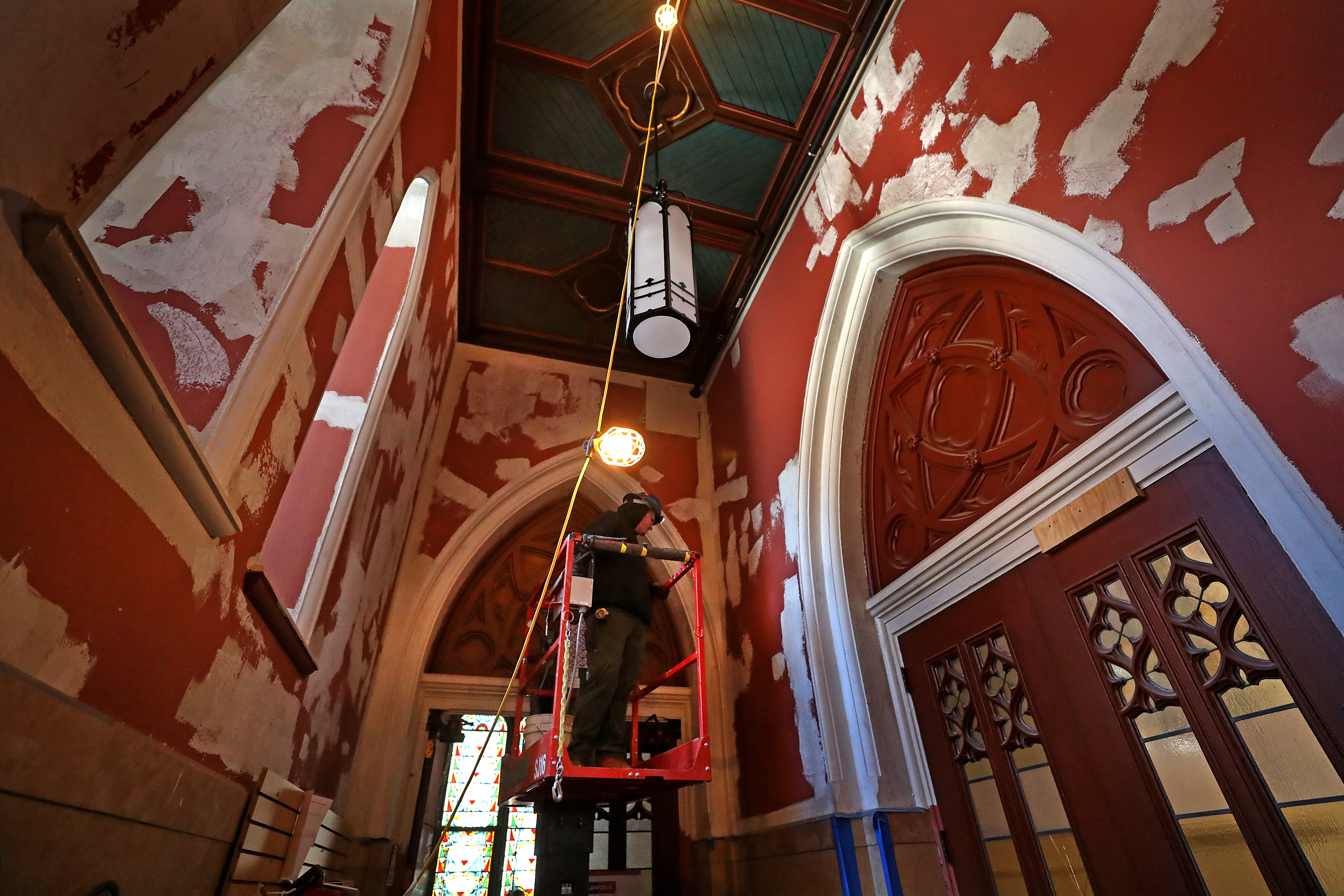 The front entrance of the cathedral was prepared for painting last week.