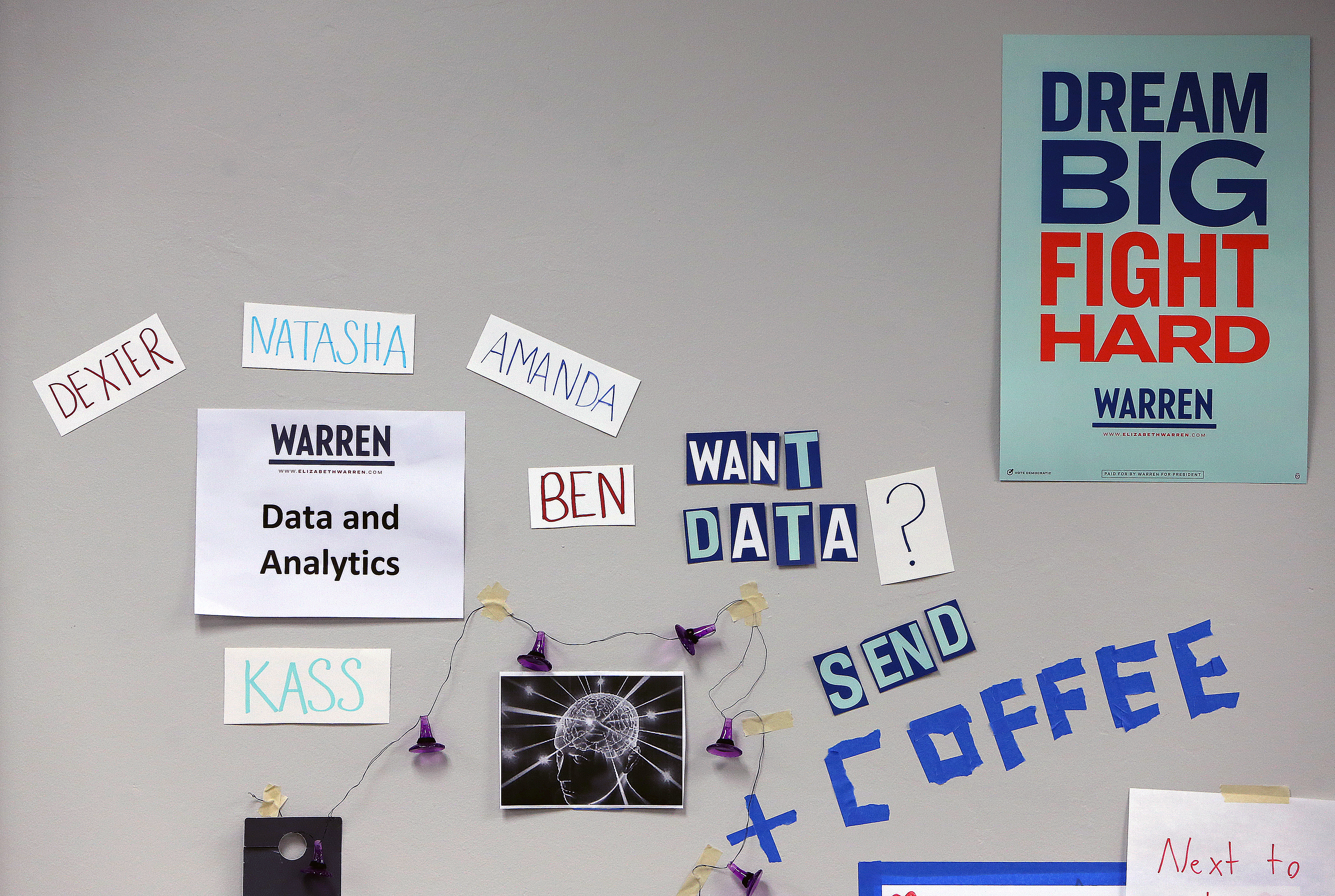 The data and analytics team at Warren headquarters signals its desire for coffee.