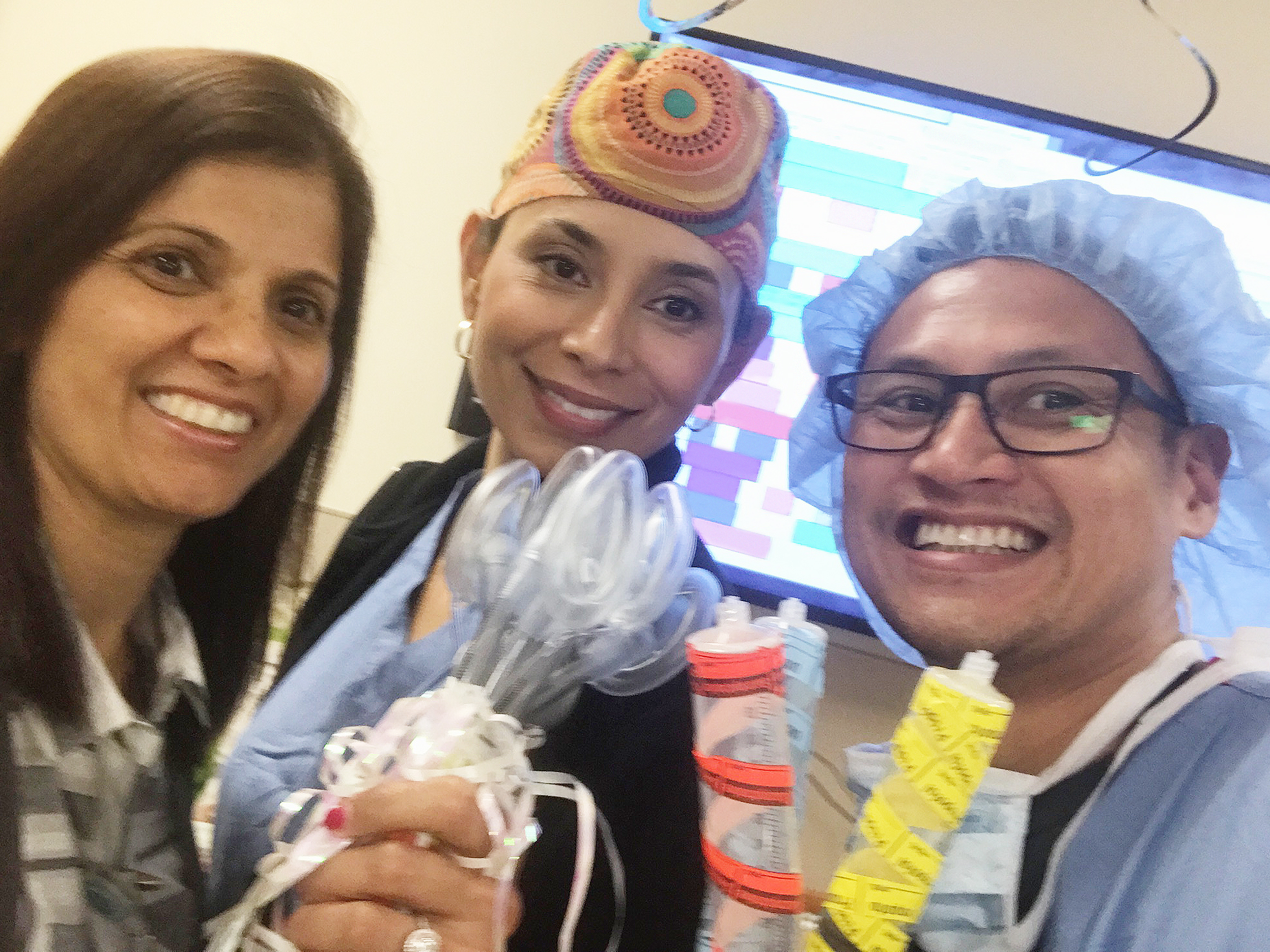 Dr. Lina Bolaños (center) with Dr. Nita Sahani and Dr. Martin Hortaleza.
