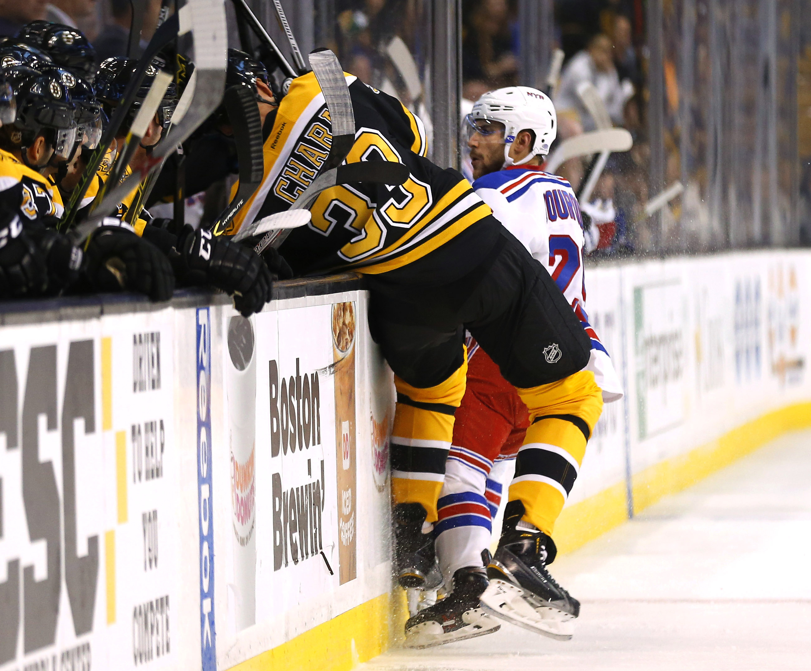 Zdeno Chara left with an upper-body injury shortly after a hit from Ranger Ryan Bourque.